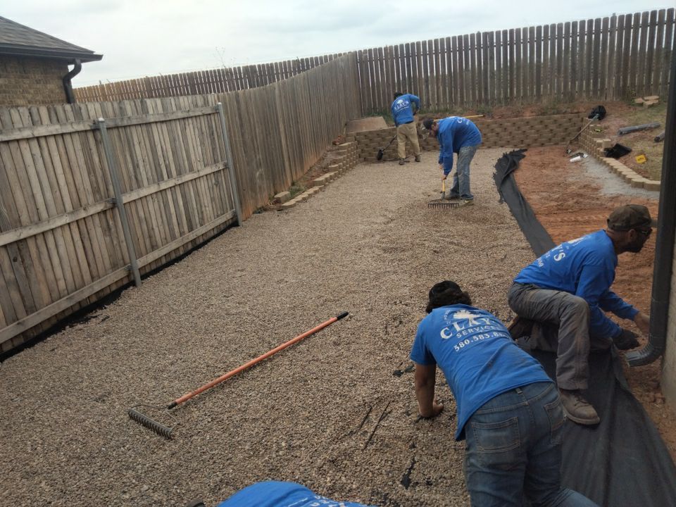 Retaining wall / Playground by Clays Services Inc