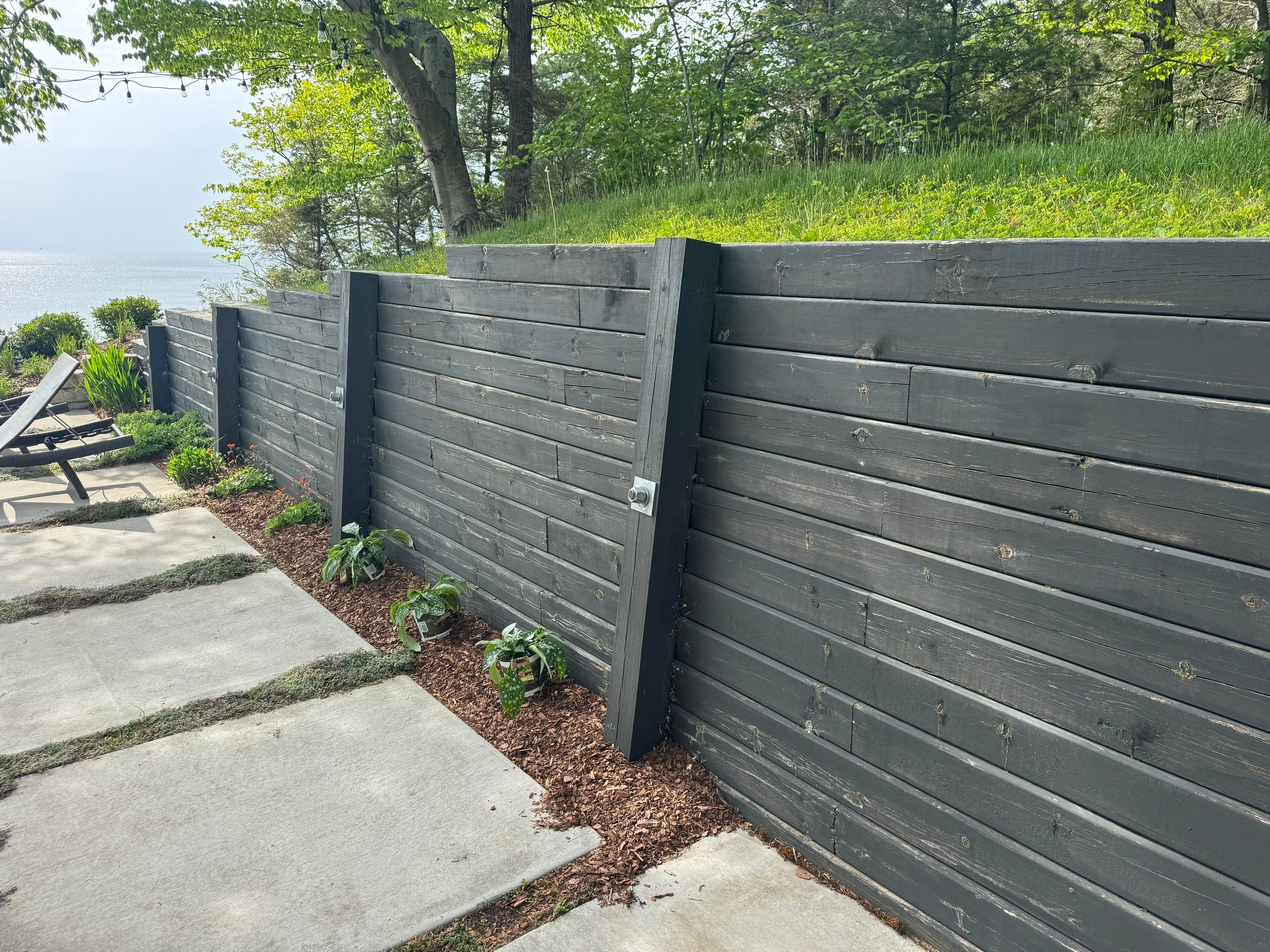 Exterior Retaining Wall Painting | Grand Haven, Michigan by Gordon Painting