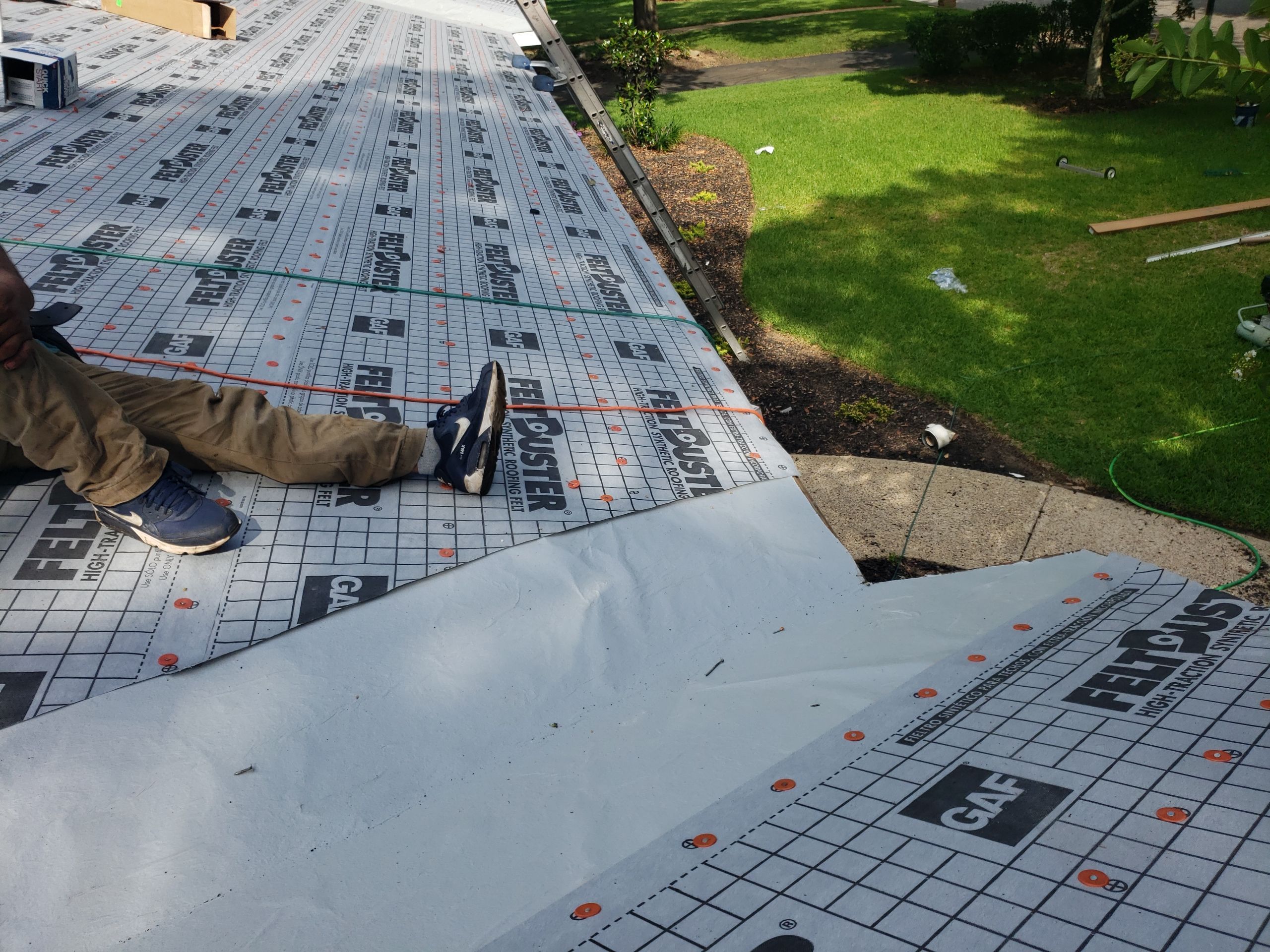 Residential Roofing Installation using Roof Replacement by American Roofing & Construction LLC