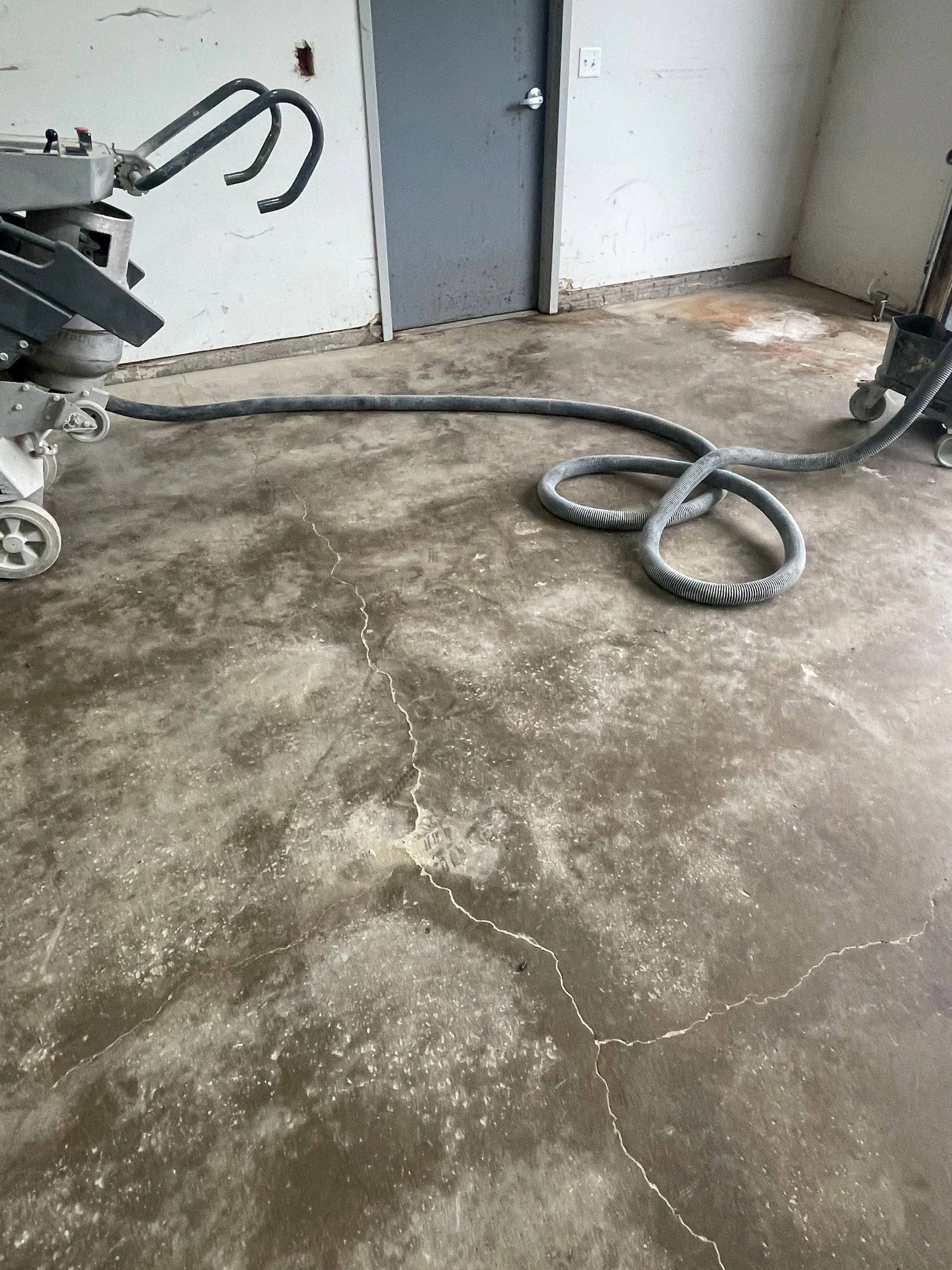 Coyote Flake Concrete Coating for Sioux Falls Garage by Select Painting, Coatings & Garage Cabinets