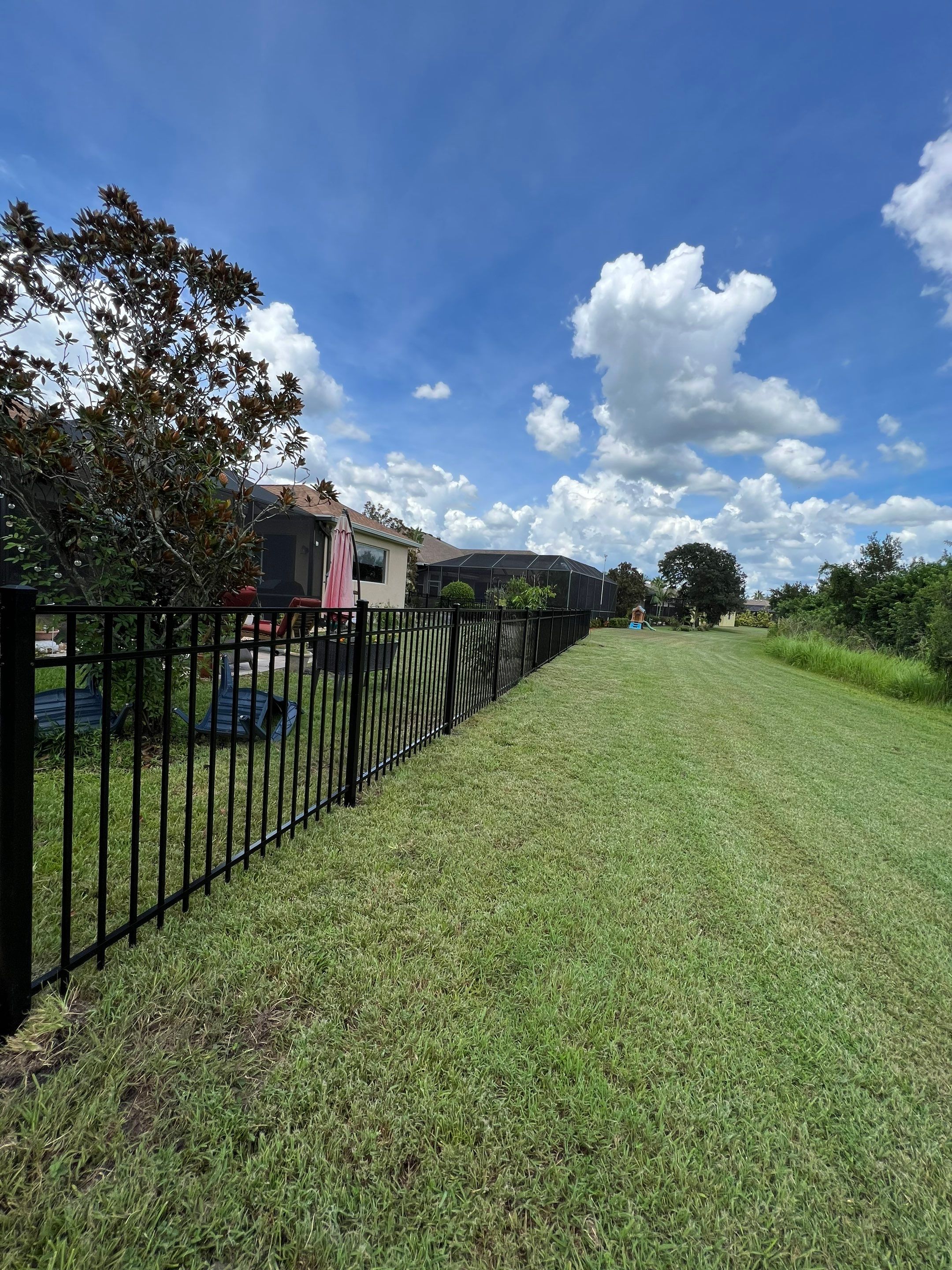 Black Aluminum Fence Installation in Bradenton, FL by Asap fence and gates, LLC