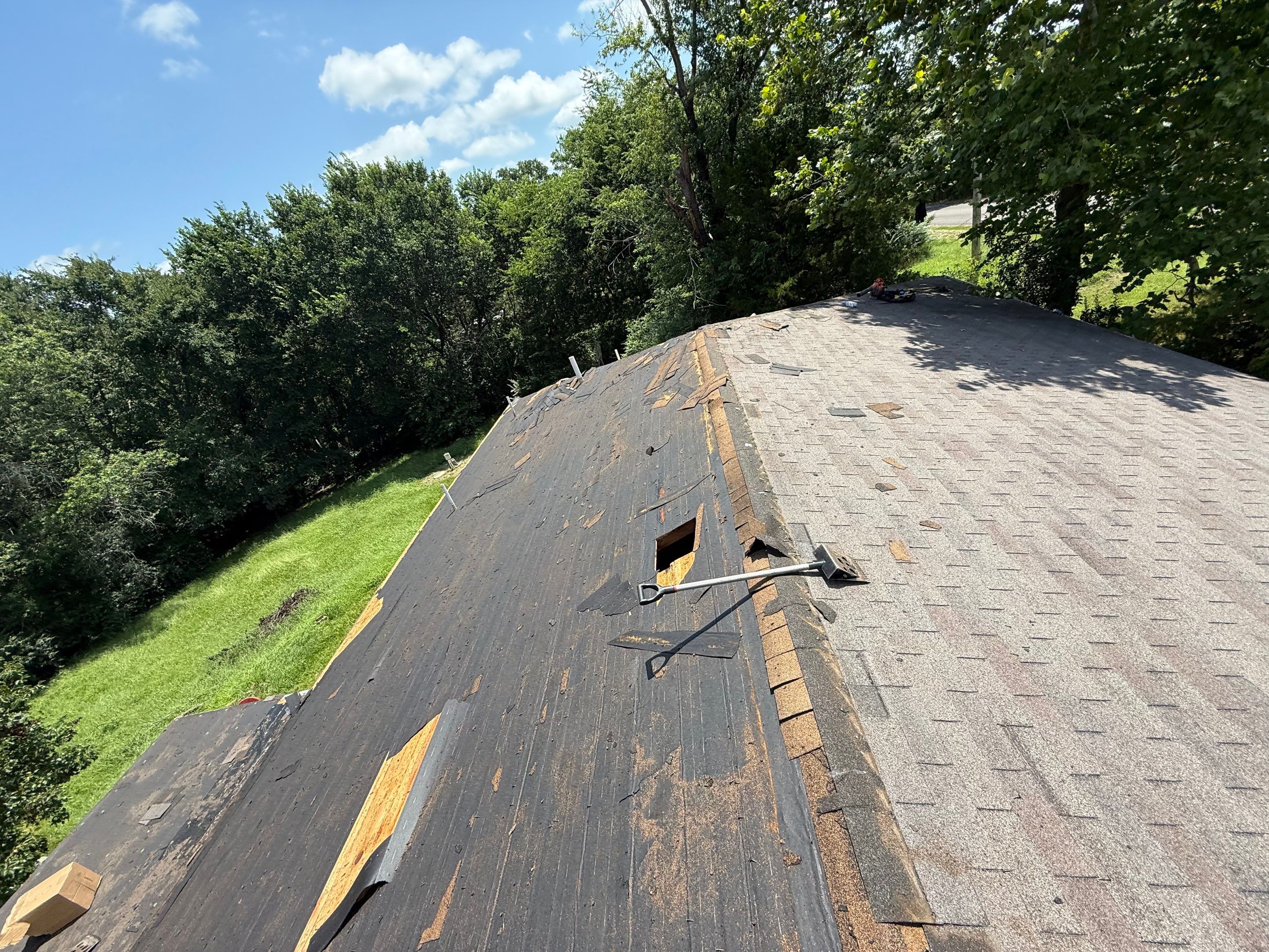 2 layers tear off & installation of new architectural shingles. by In & Out Construction & Remodeling, LLC