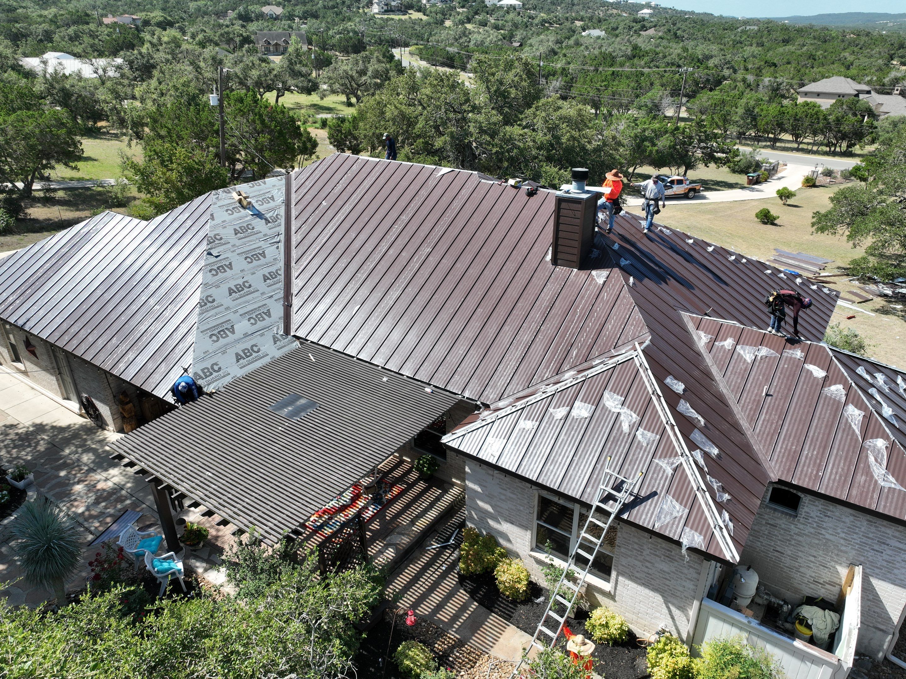 Residential Metal Roof Installation using McElroy Metal by Premier Roofing and Contracting