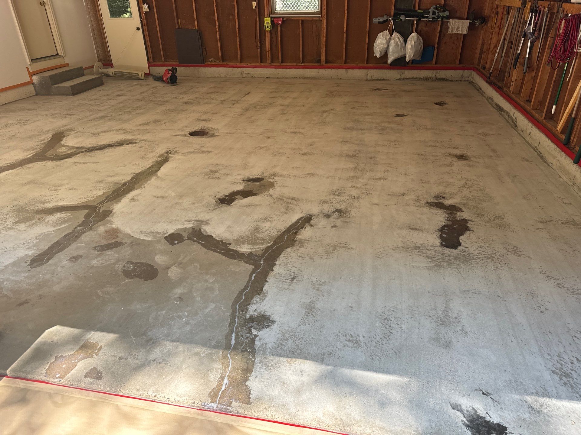 Grand Haven Garage Floor Renovation with Epoxy Flake Coating by Gordon Painting