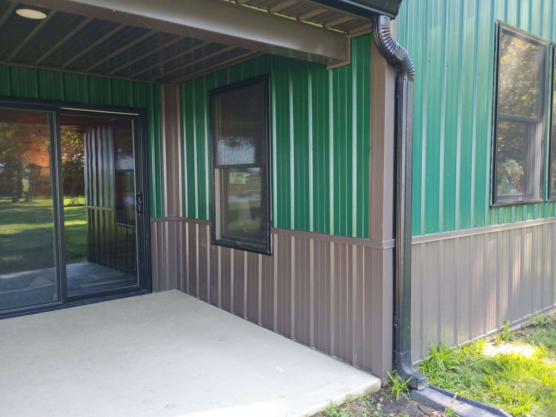 Siding Installation using Platinum AG Panel Burnished Slate  by Nitro Roofing and Construction