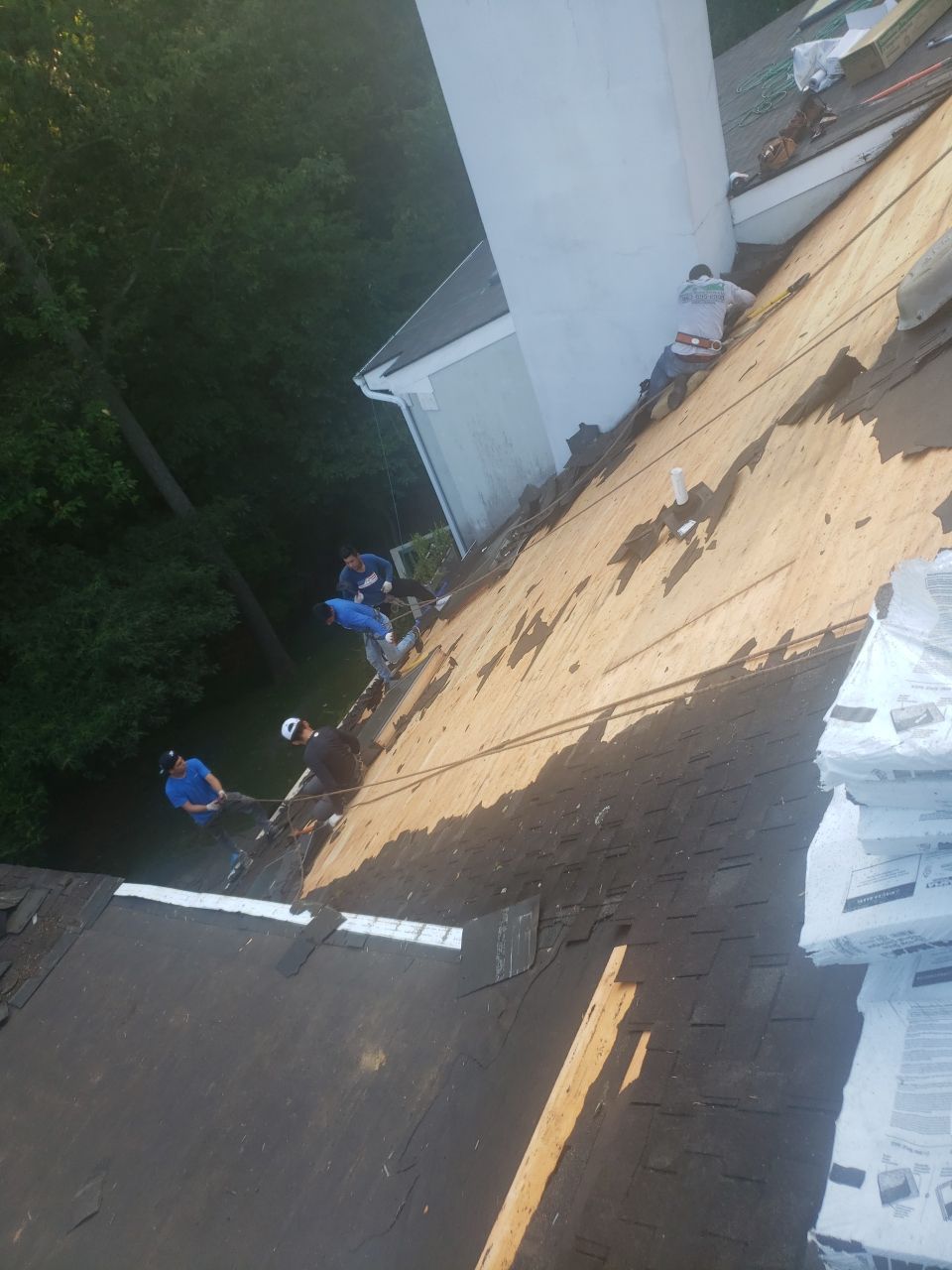Skylight, Roof, and Gutter Replacement by American Home Contractors