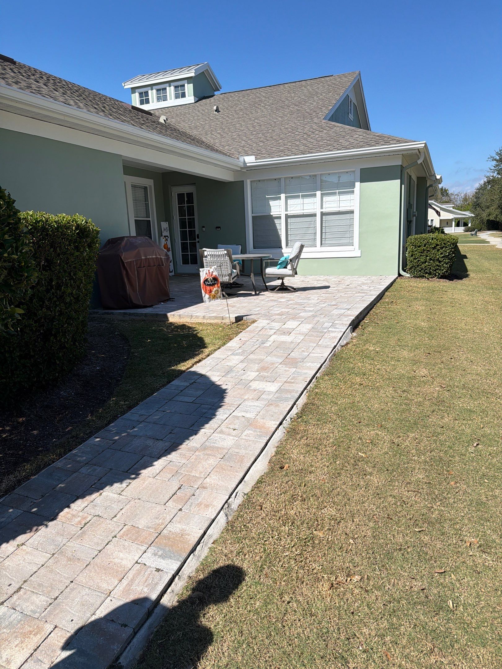 Multi-Toned Paver Patio and Walkway sealing in Mira Bay Apollo Beach by Supreme Paver Experts
