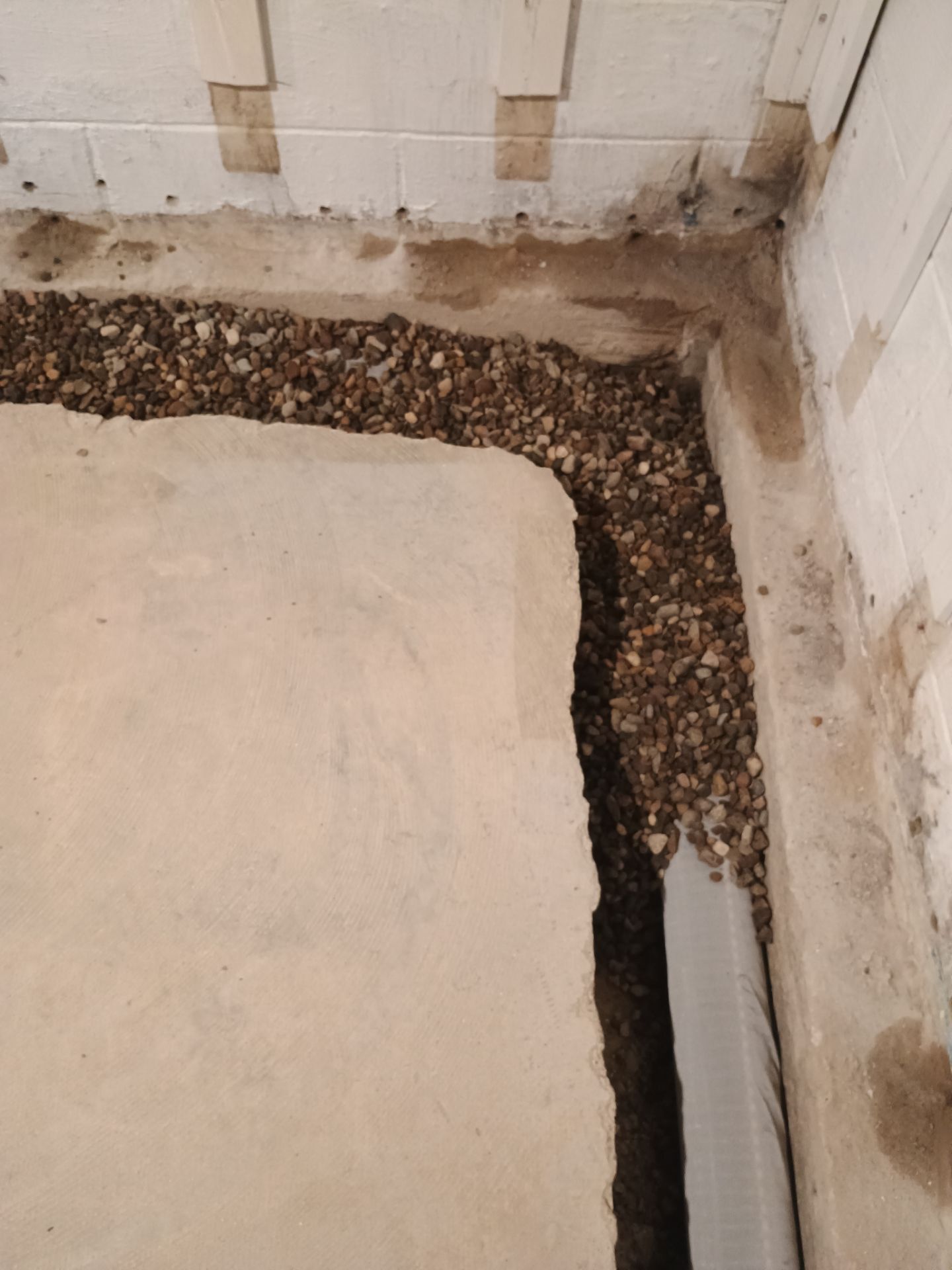 Interior Drain Tile & Buried Discharge in St. Anthony, MN by Waterproofing Northeast