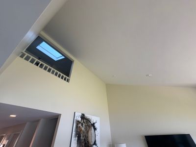 Interior Drywall Repair and Vaulted Ceiling Painting in Spring Lake