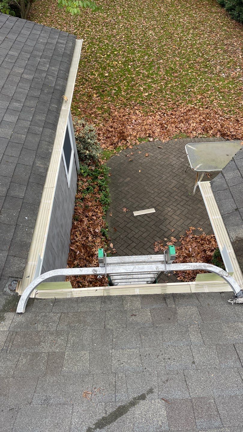 Gutter Installation using 5"white K style seamless gutters and 2x3 white leaders, and Microguard gutter shields installed.  by Above All Gutters 