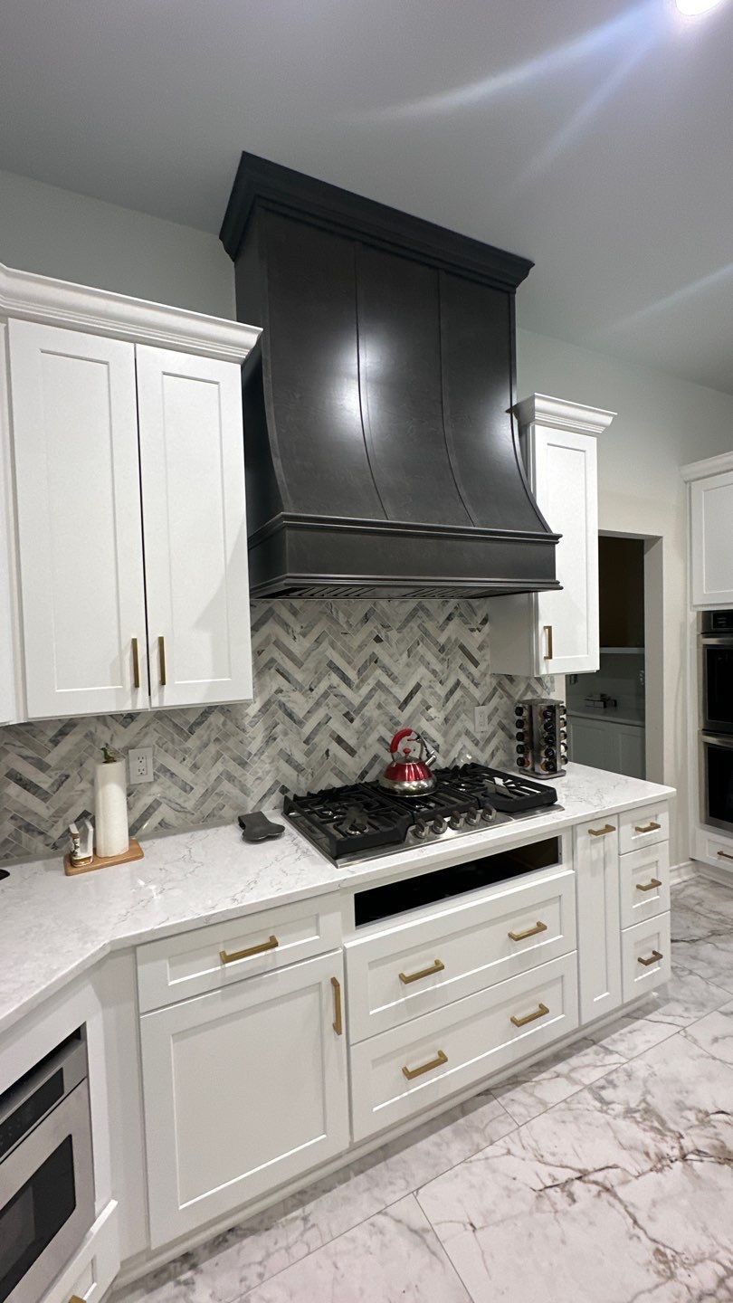 Luxury White Kitchen Remodel in The Dominion Featuring Custom Cabinetry and Marble Finishes by Legacy Bath and Kitchen