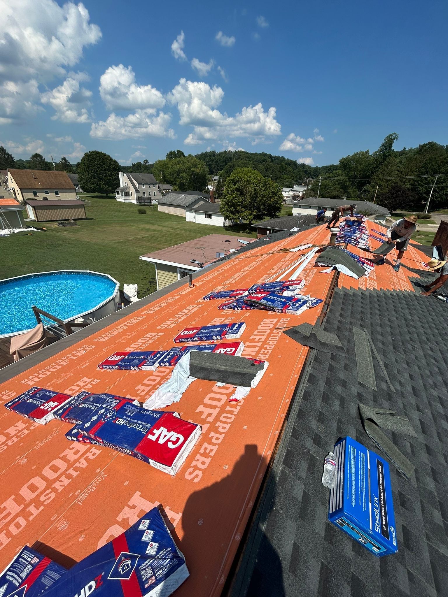 Residential Roofing Installation using GAF Timberline HDZ Charcoal by Rainstoppers Roofing