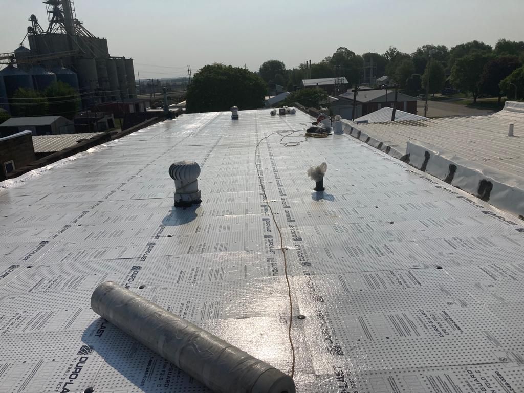 Recover of a downtown building  by Grell Roofing, LLC