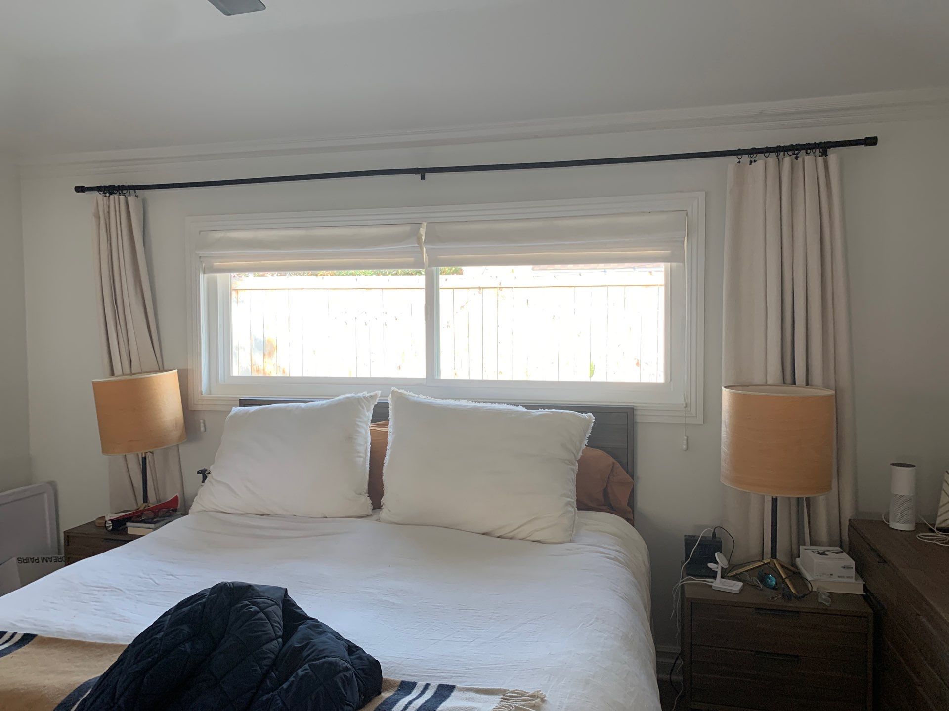 Window Installation using Milgard black vinyl windows by American Window Company