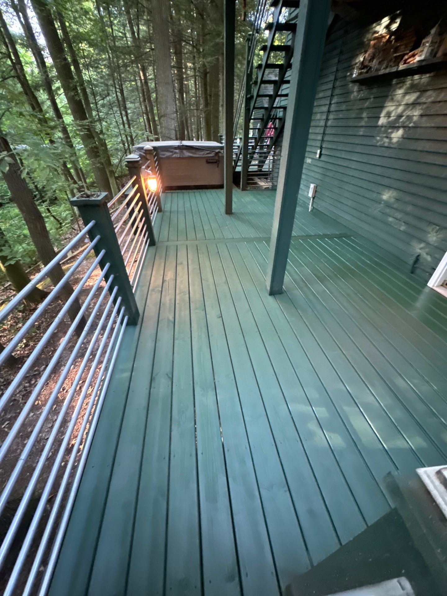 Solid staining decking and stairs. by Gordon Painting