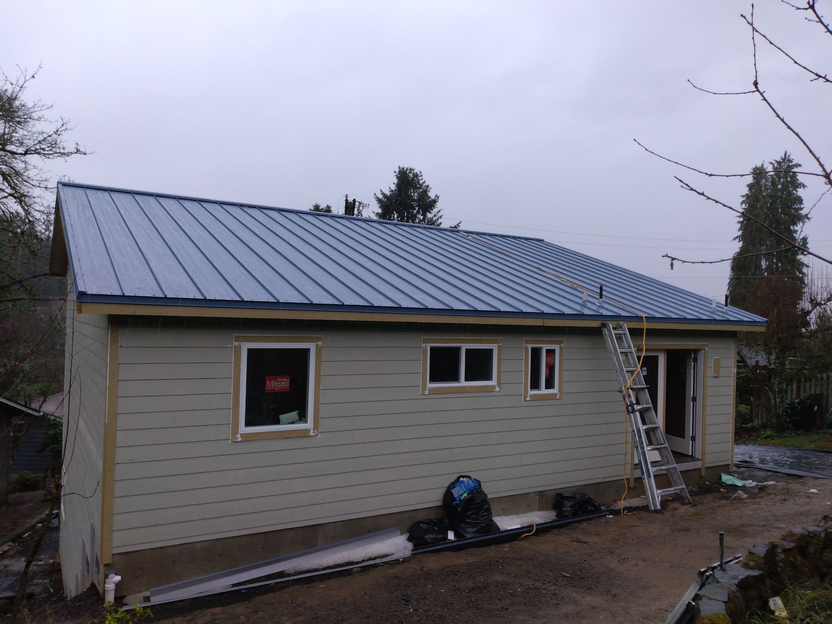 Roof Replacement - Metal Roof using ASC 16" 26g Skyline Panel by BEST Roofing & Waterproofing