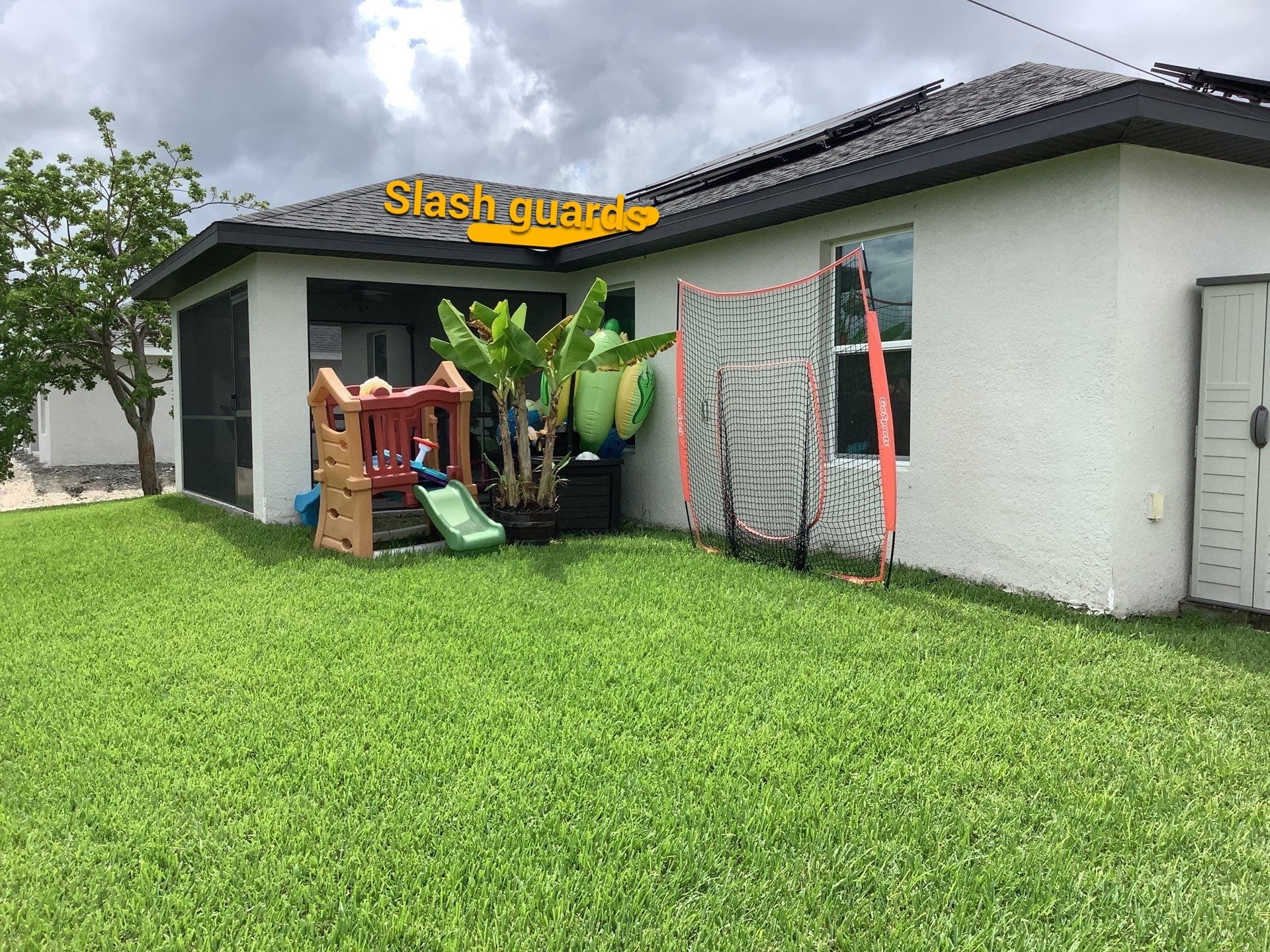 Black Seamless Gutters using black seamless gutters in Cape Coral FL by Gutter Professors