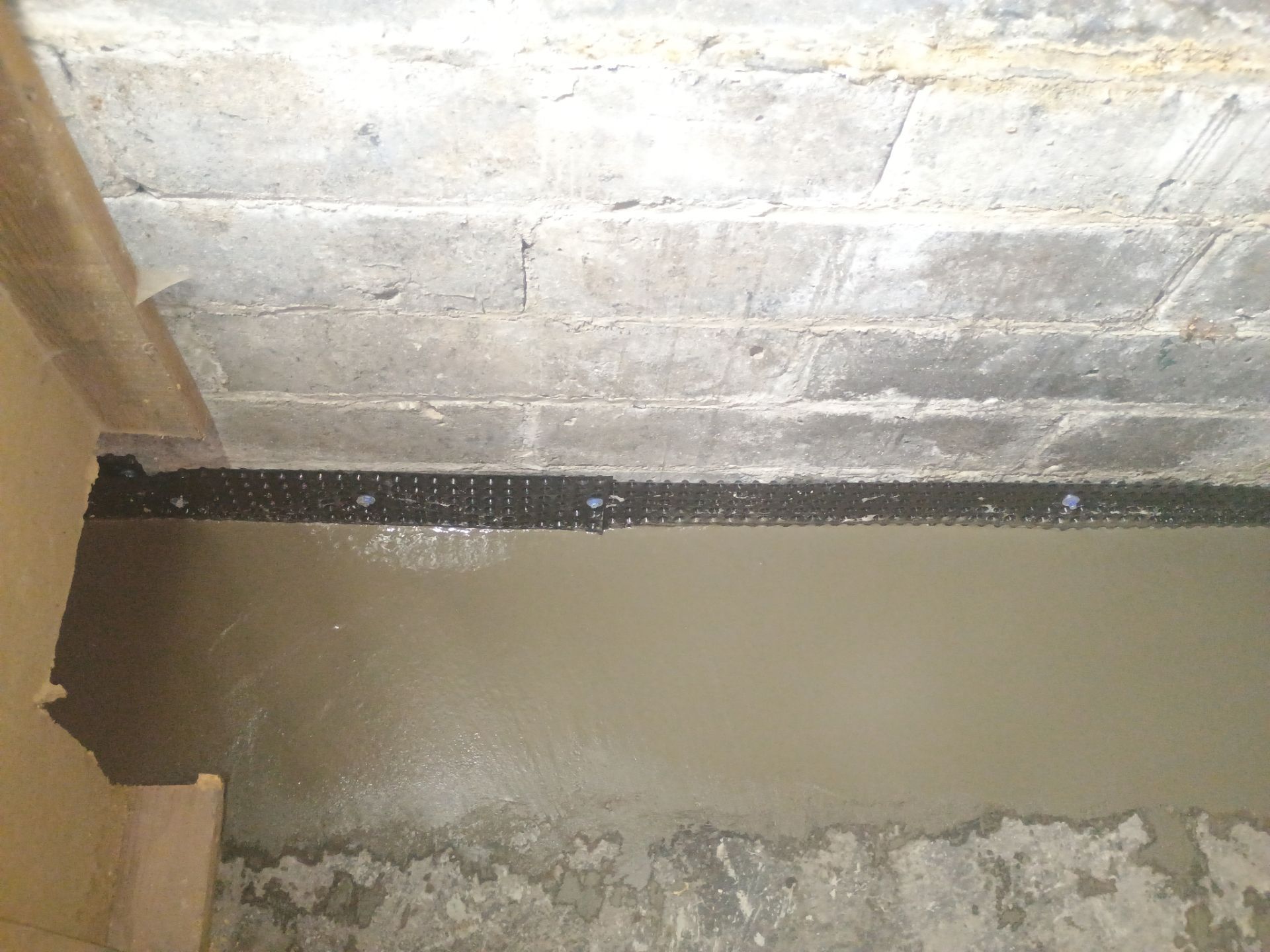 Interior Drain Tile for a South Minneapolis Basement by Waterproofing Northeast