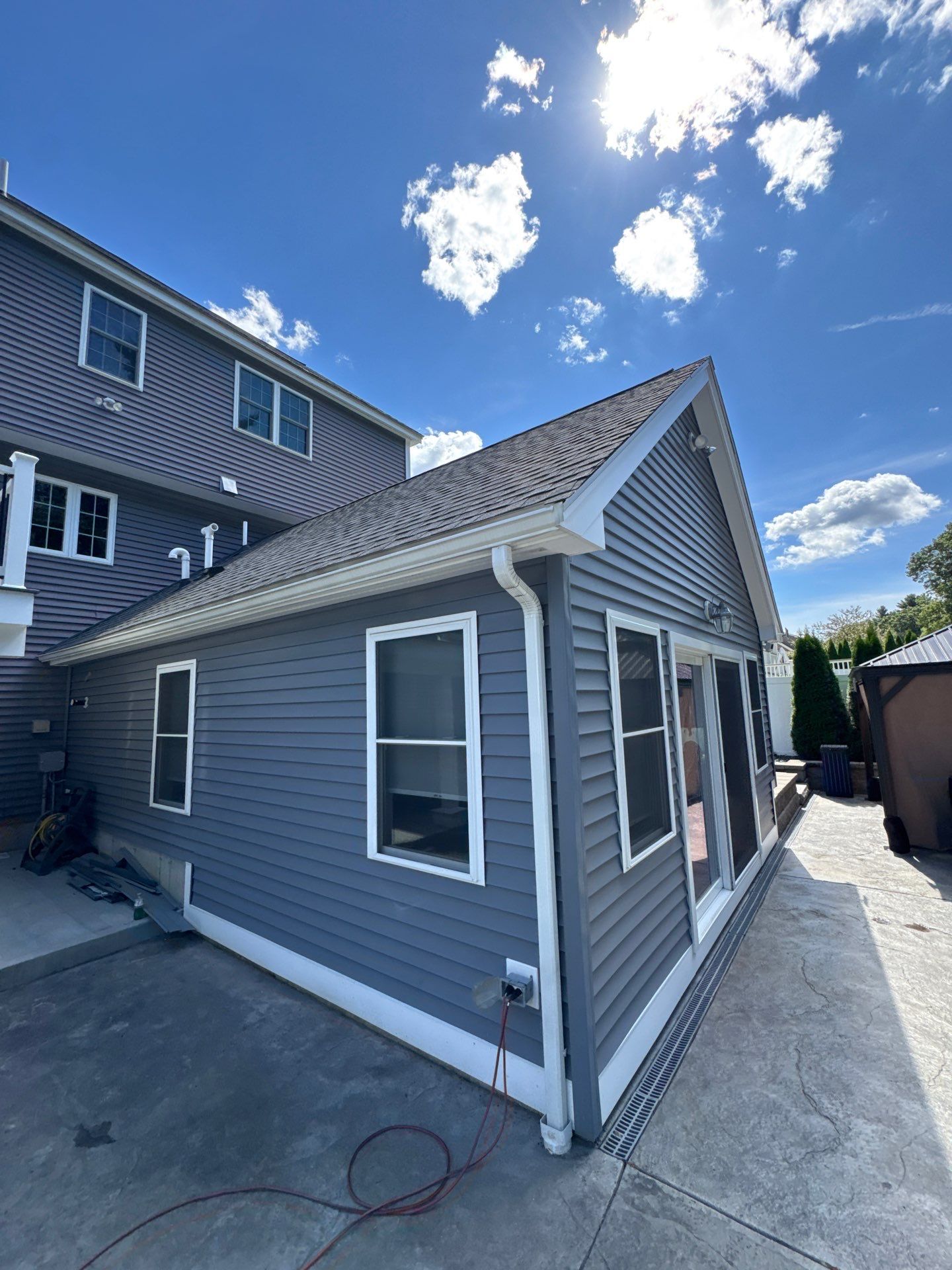 Roof, Trim, Deck, and Gutter Restoration by Mighty Dog Roofing of Greater Middlesex County