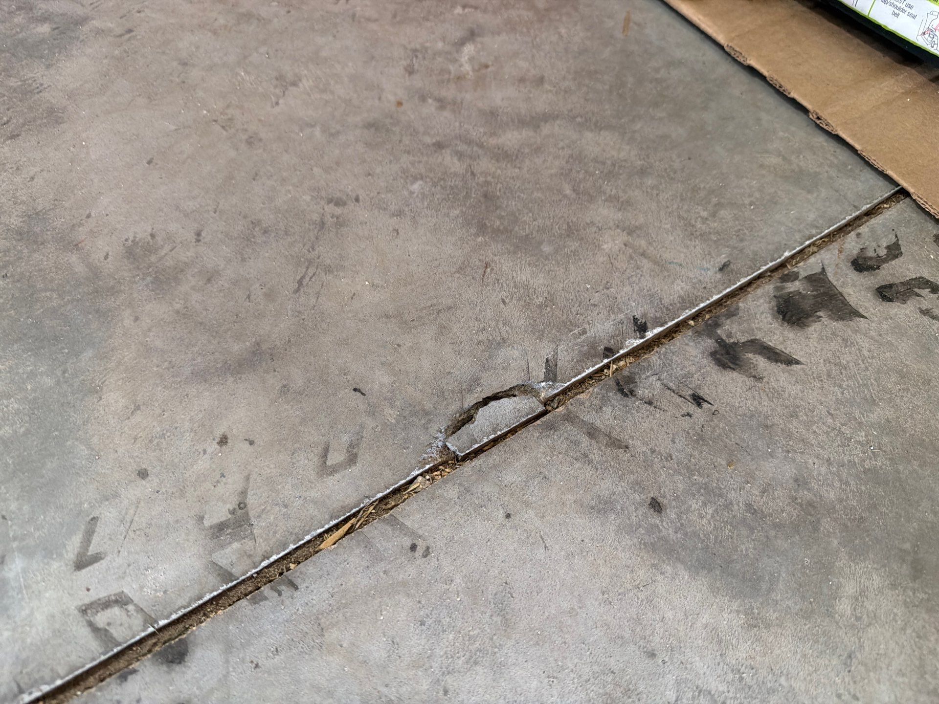 Epoxy Garage Floor Coating with Decorative Flake in Harrisburg by Select Painting, Coatings & Garage Cabinets
