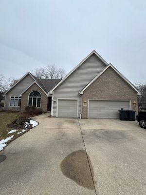 Exterior Home Staining Project in Greenfield Using Sherwin-Williams Amazing Gray
