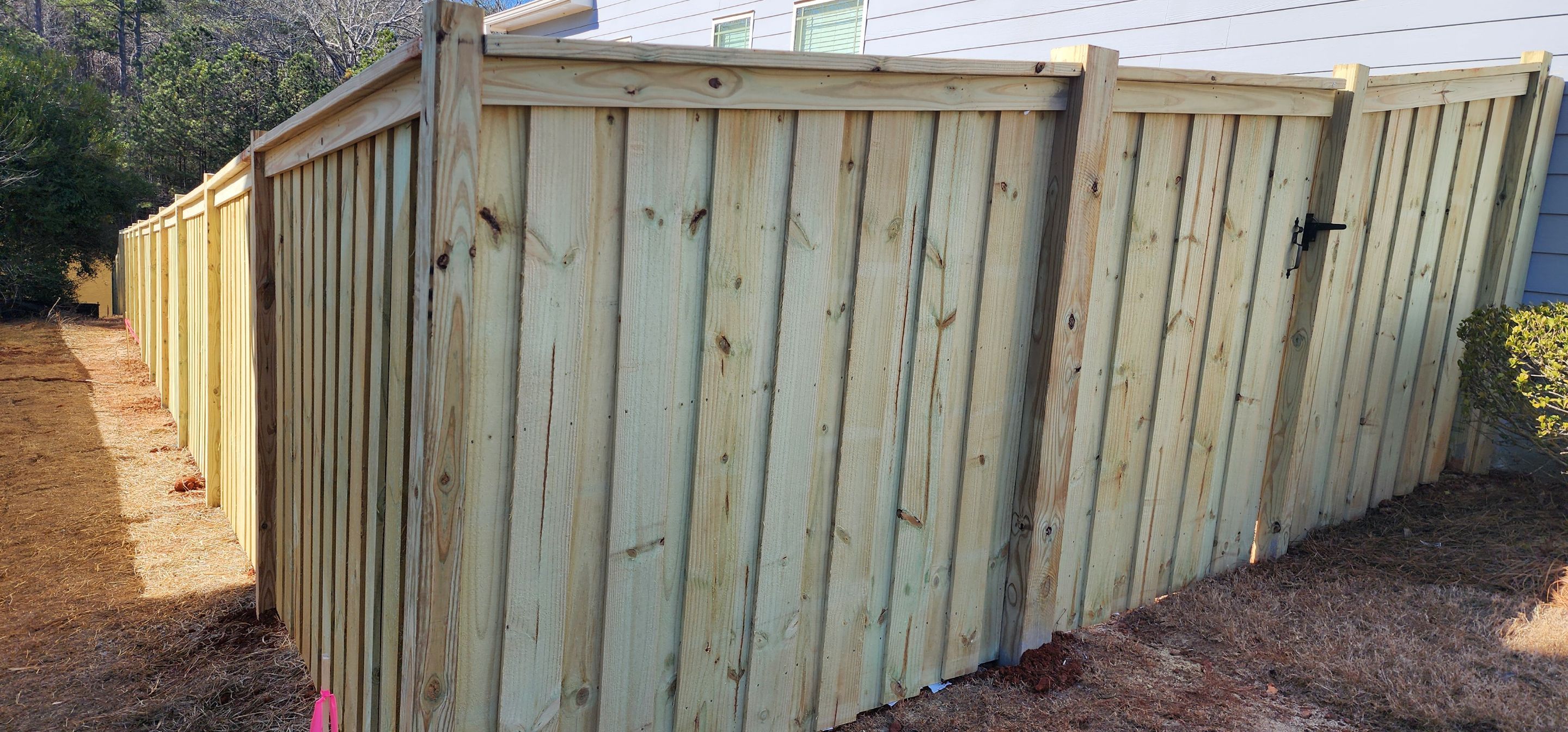 Fence Installation of Board on Board Capped Privacy by Titans of Timber Fence & Stain