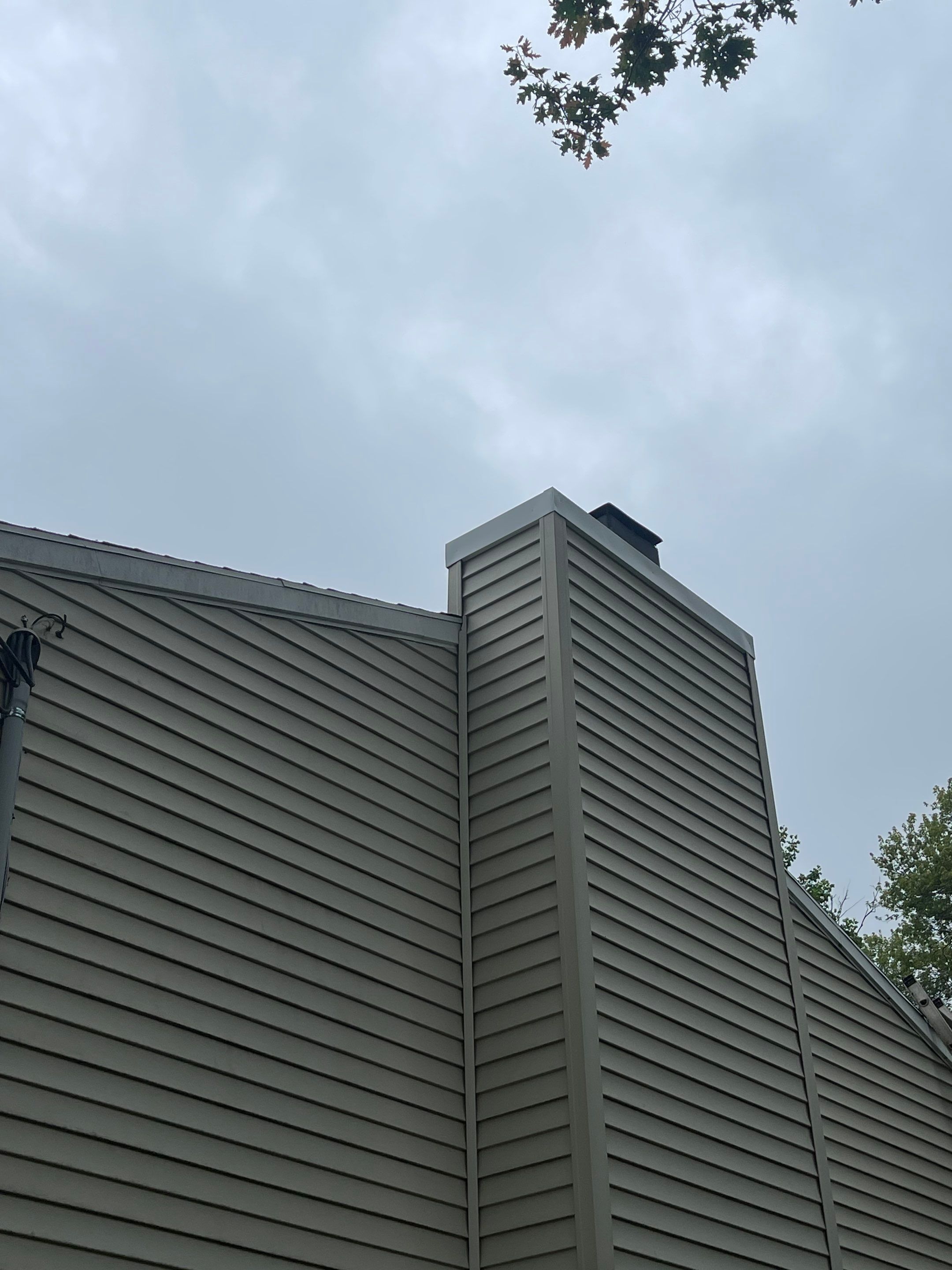 Gutter Cleaning Chimney top repair by A Plus Exterior