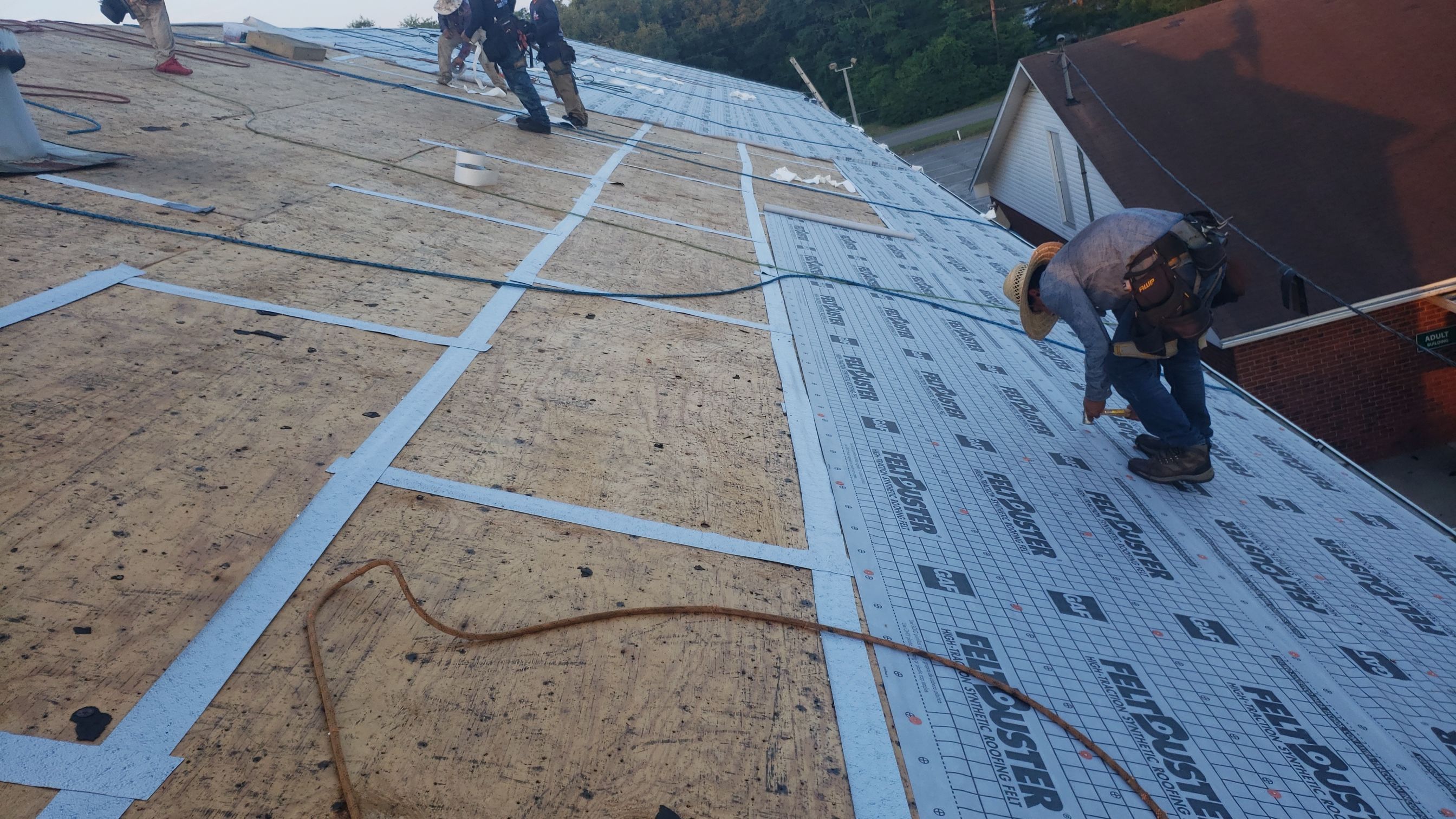 Residential Roofing Installation using Roof Replacement by American Roofing & Construction LLC