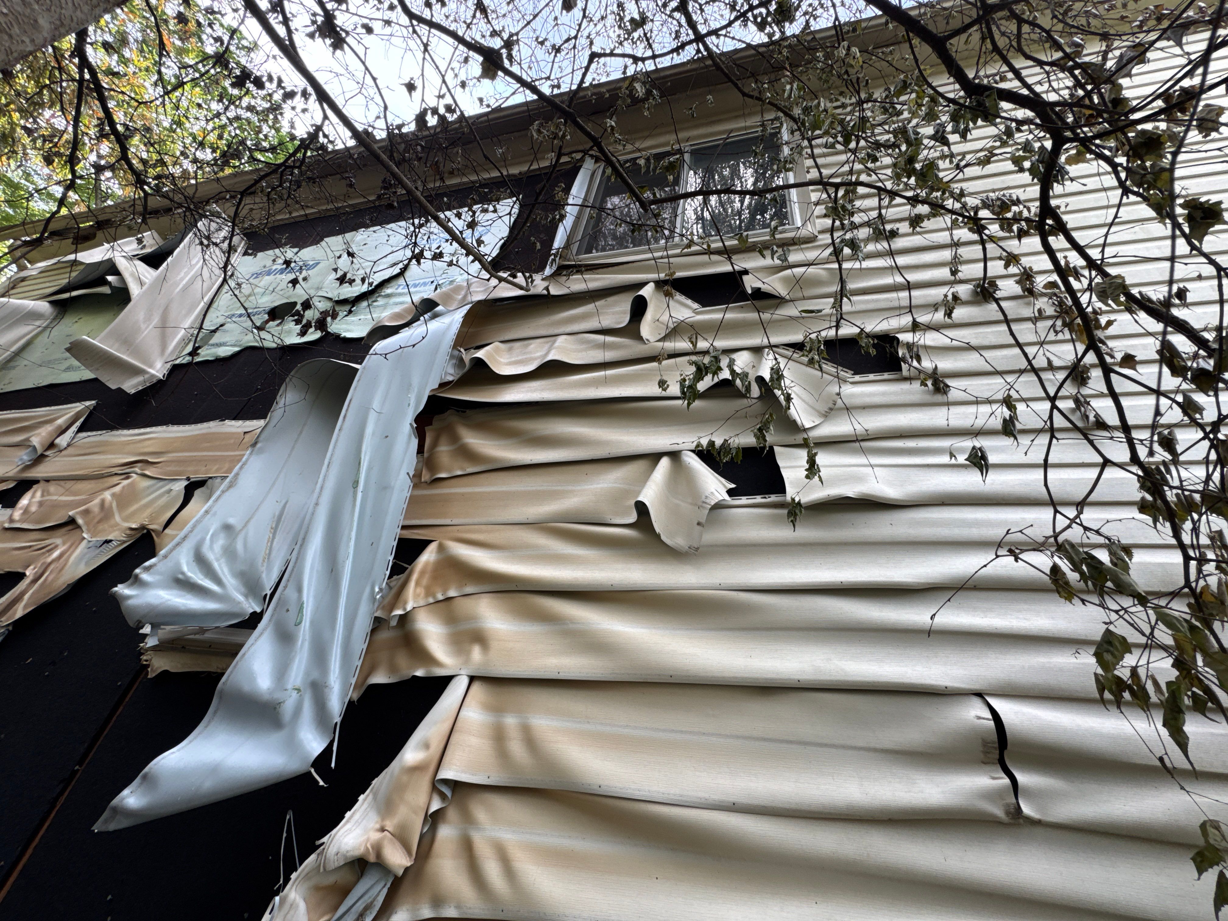 Vinyl Siding Replacement by USA Storm Roofing and Construction Group