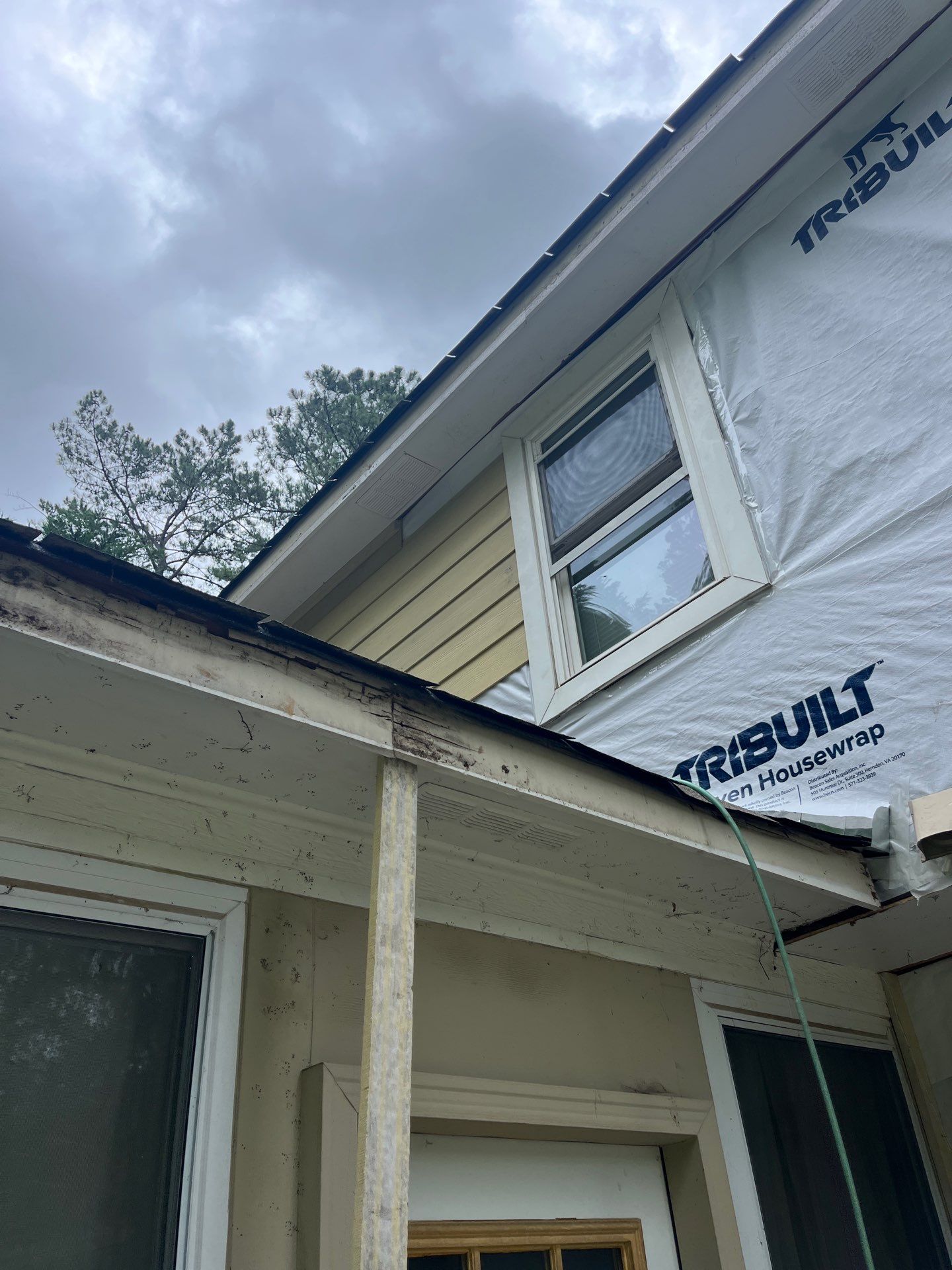 Marietta, GA Siding, Rotten Wood, Front Door, and Gutter Replacement with Exterior Painting by Nelson Exteriors