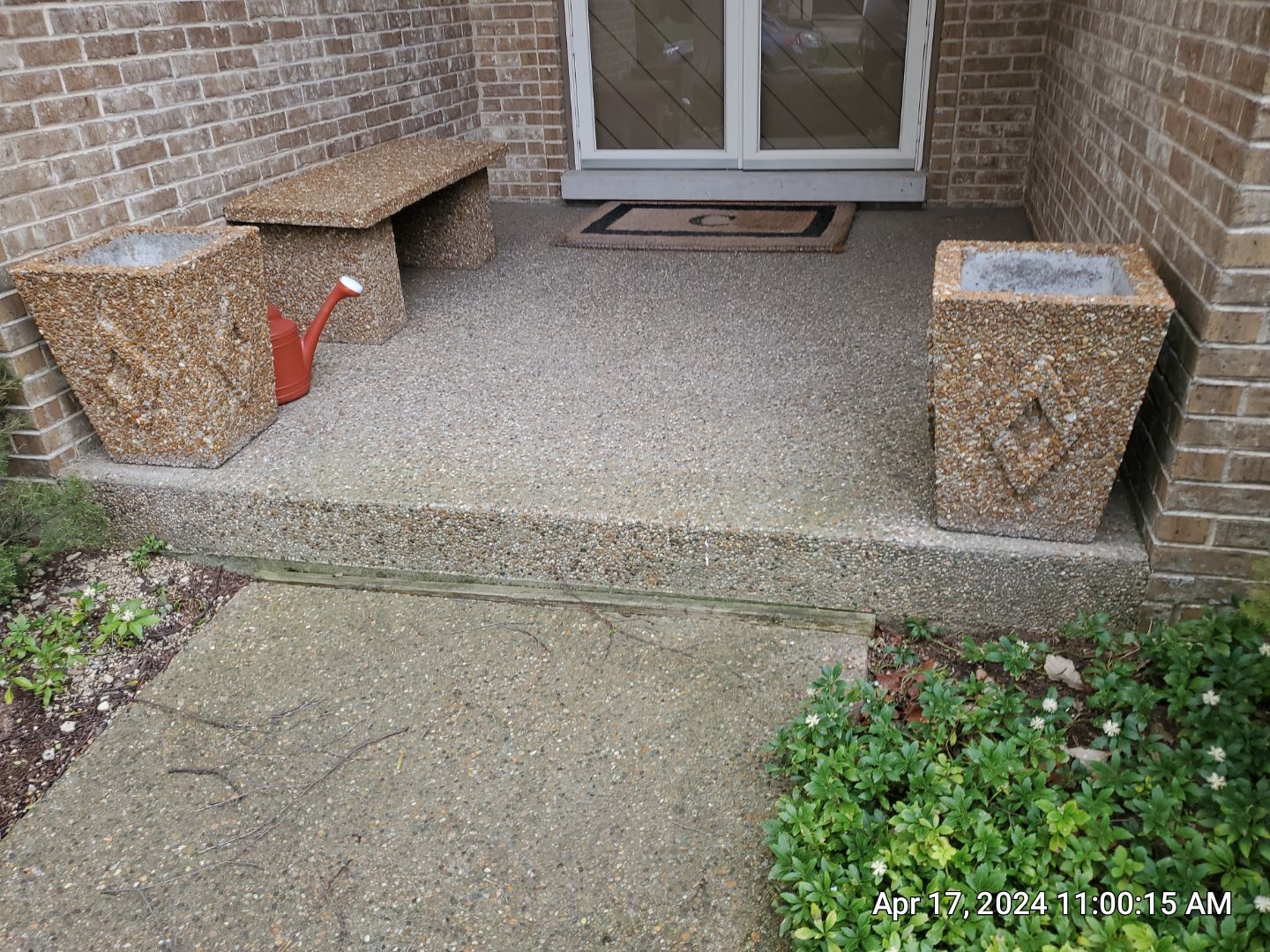 concrete patio and driveway cleaning by Northern Power Washing LLC.