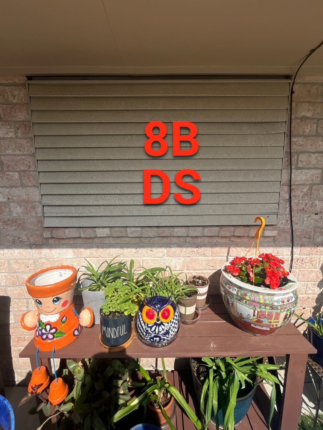 Colored Vinyl Windows to blend into brick by Bayfront Roofing and Construction