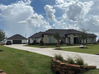 Waller Estate Elegance: Apex Stucco with Grand Stone Accents