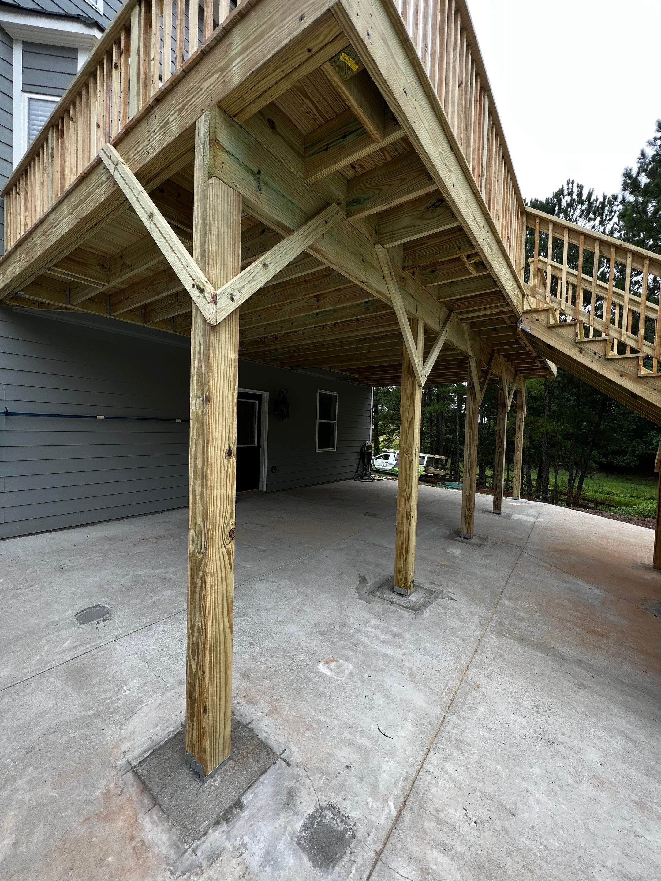 Elevated Pressure-Treated Wood Deck Replacement in Cartersville Georgia by Swift Home Renovations