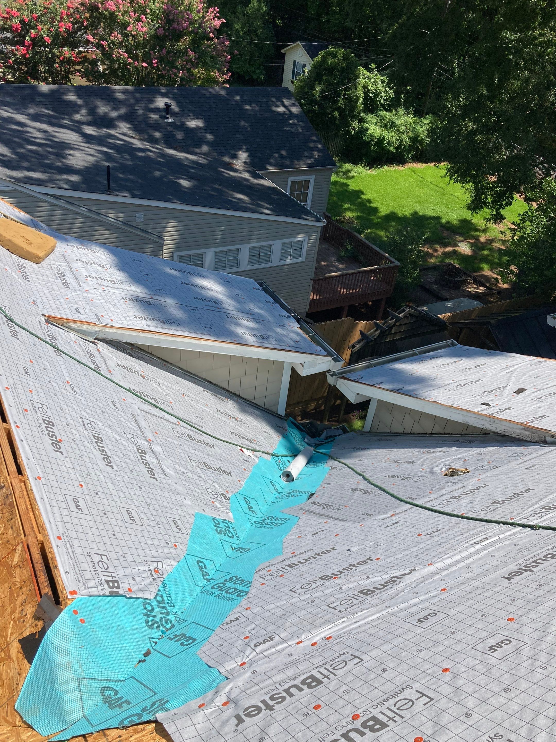 Residential Roofing Installation using Architectural Shingles by The Roofing Dudes