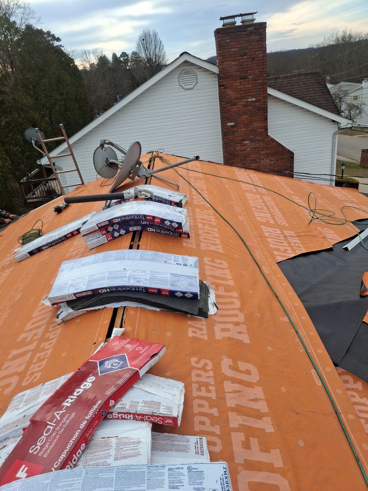 Residential Roofing Installation using GAF Timberline HDZ Charcoal by Rainstoppers Roofing