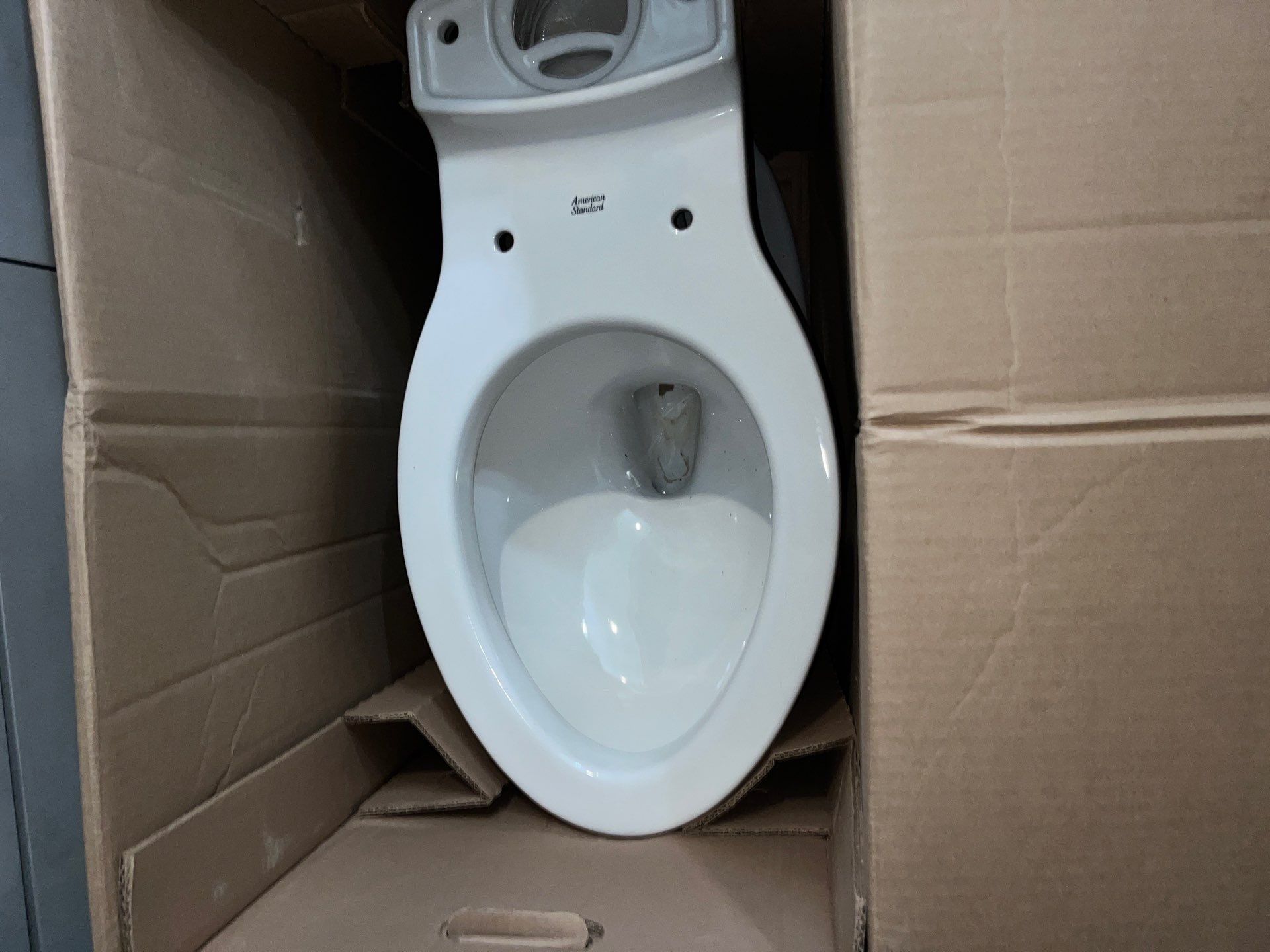 Installed Toilet and Shower Fixtures by Us Plumbing 