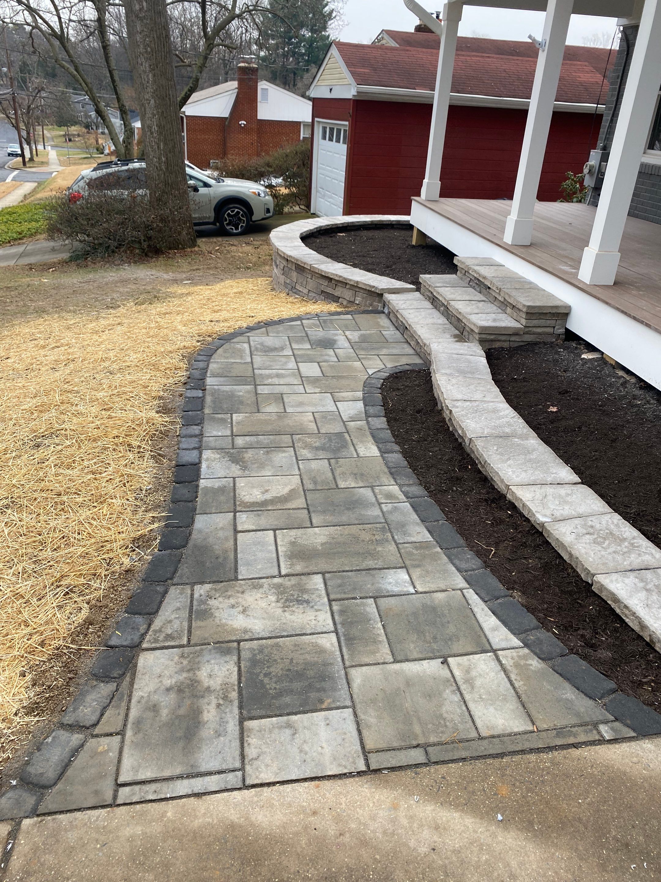 Retaining wall, walkway, small patio and landscape install by The Smet Companies, LLC
