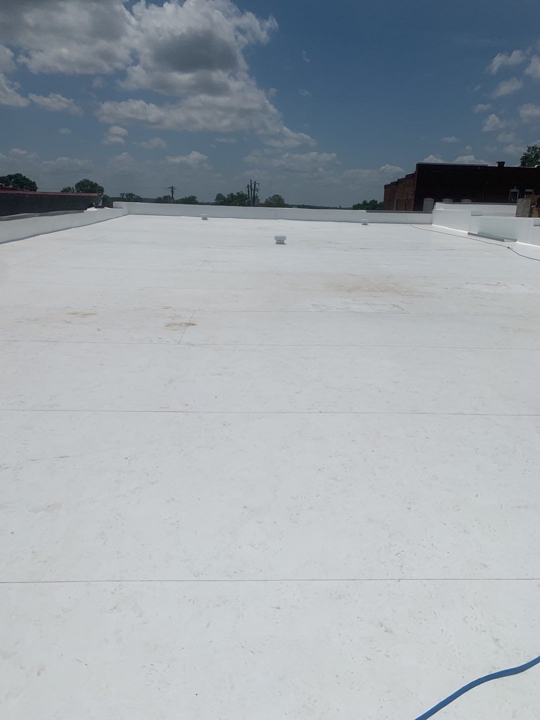 Commercial Roofing Installation in DeQueen, AR, using 50 mil PVC by Hostetler Roofing