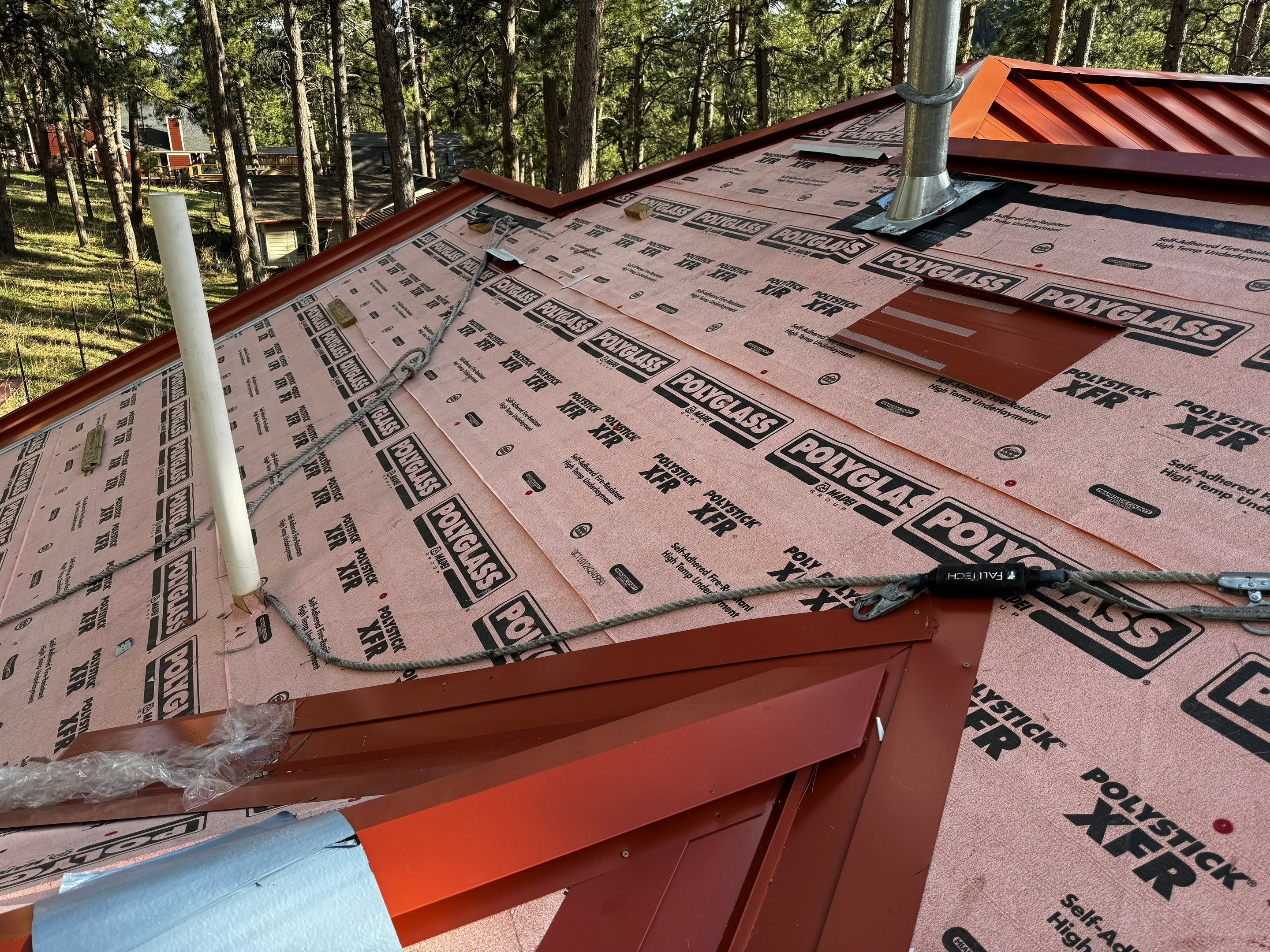 Residential Roofing Installation using Standing Seam Metal by Blue Peaks Roofing LLC 