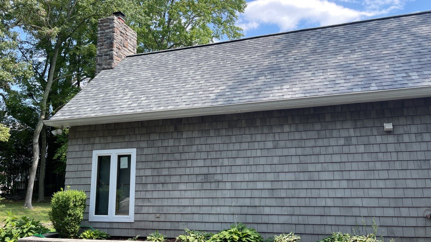 Roof Replacement using IKO Dynasty by American Home Contractors