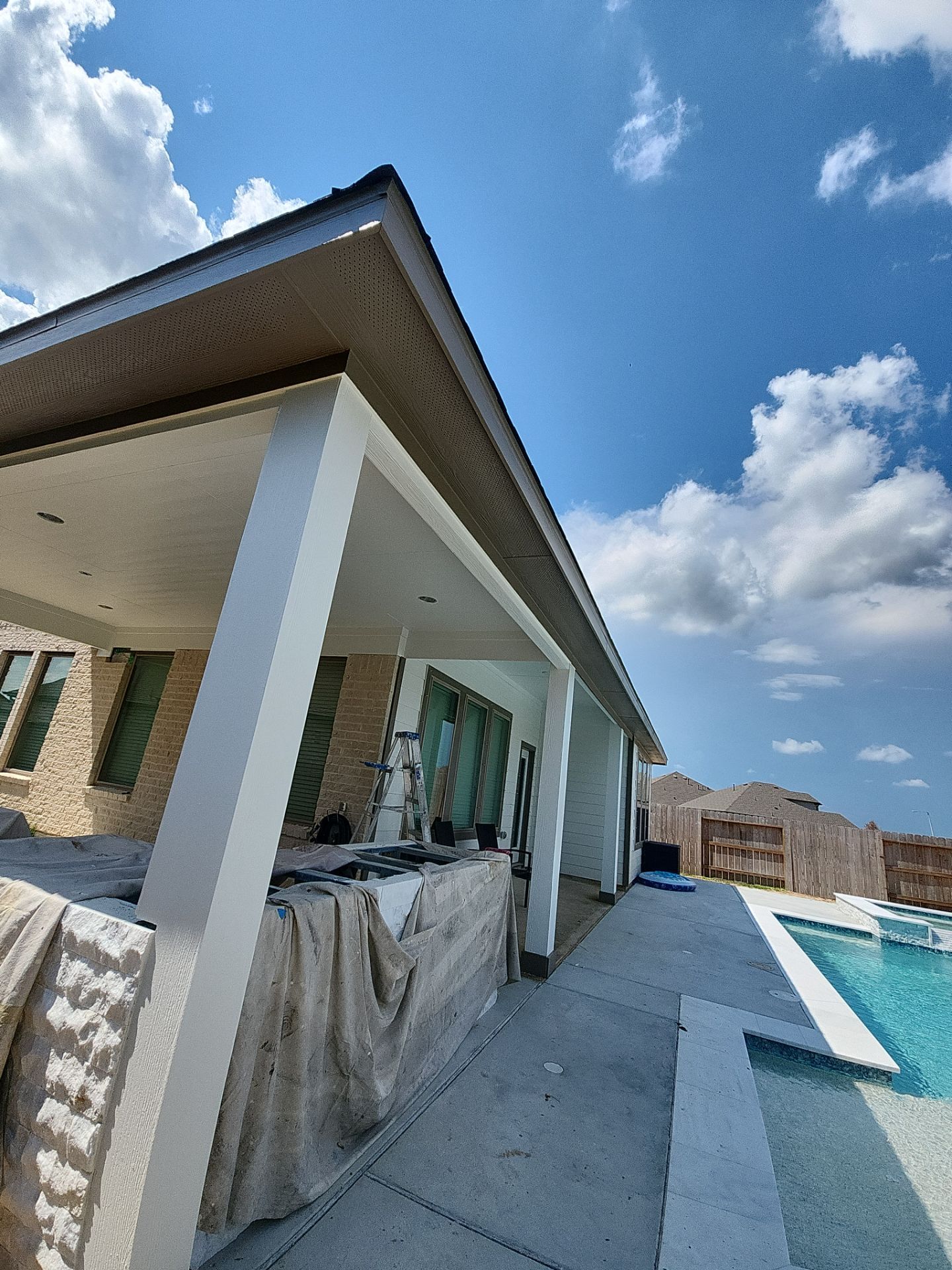 Patio and Summer Kitchen in Texas city by SophAlx LLC