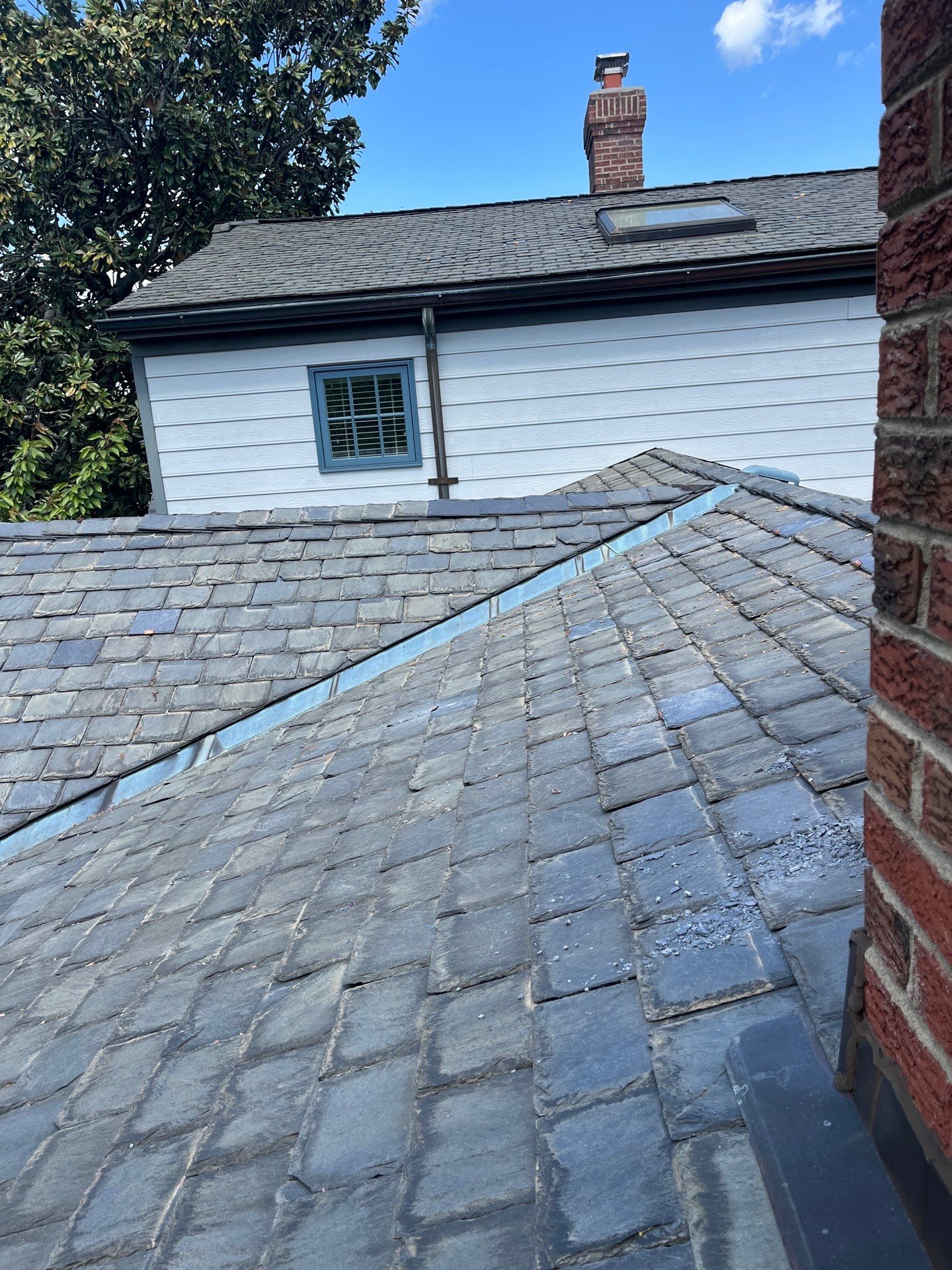 Arlington: Buckingham Slate and Carlisle Syntec TPO Roof by RM Banning, Inc.