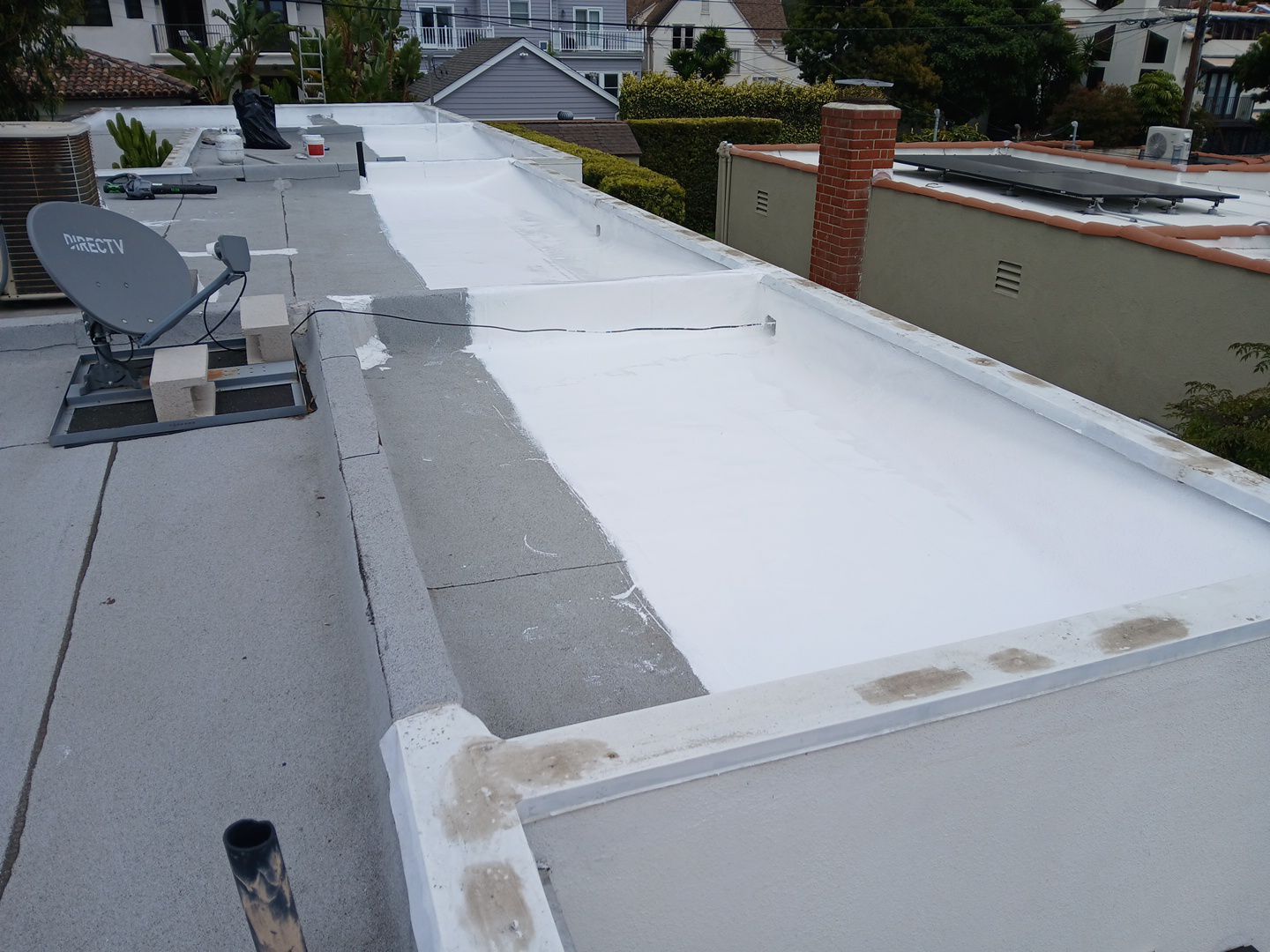 Silicone Membrane Installation using American Standard Coatings Silicone-S by Hull Brothers Roofing