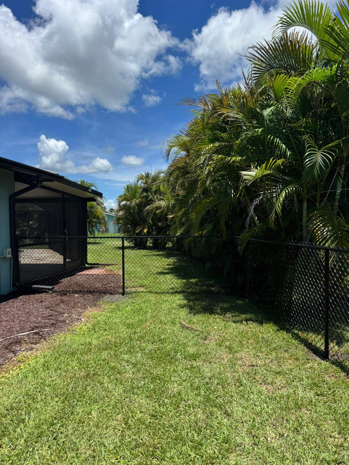 Black Chain Link Fence and Gate Installation in Rotonda West by True Fence LLC
