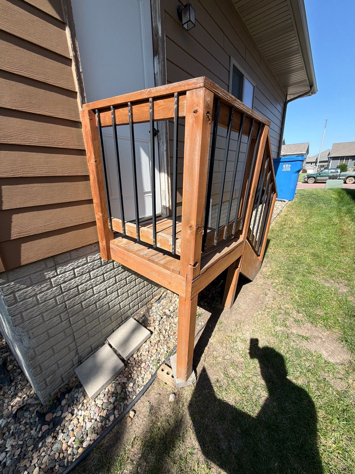 Full Exterior Residential Painting and Siding Refresh in Tea by Select Painting, Coatings & Garage Cabinets