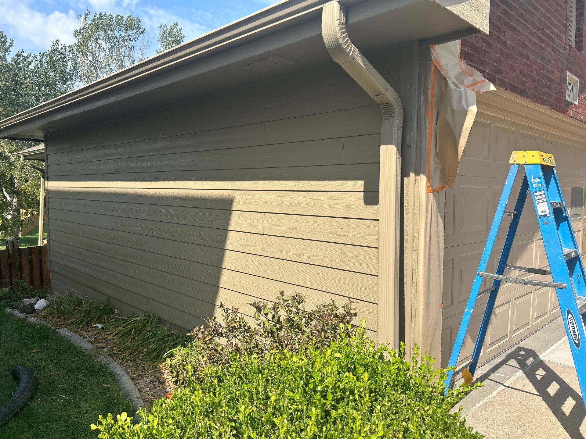 James Hardie Siding Replacement and Exterior Painting in Bellevue by Carps Complete Exteriors