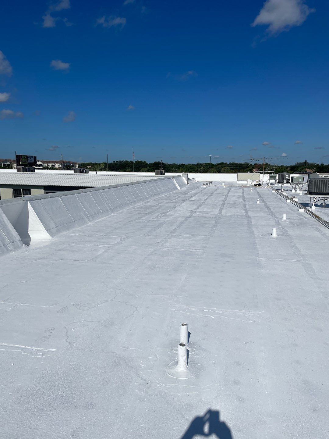 Commercial Flat Roof Waterproofing and Reflective Coating in Boca Raton by AJF ROOFING INC