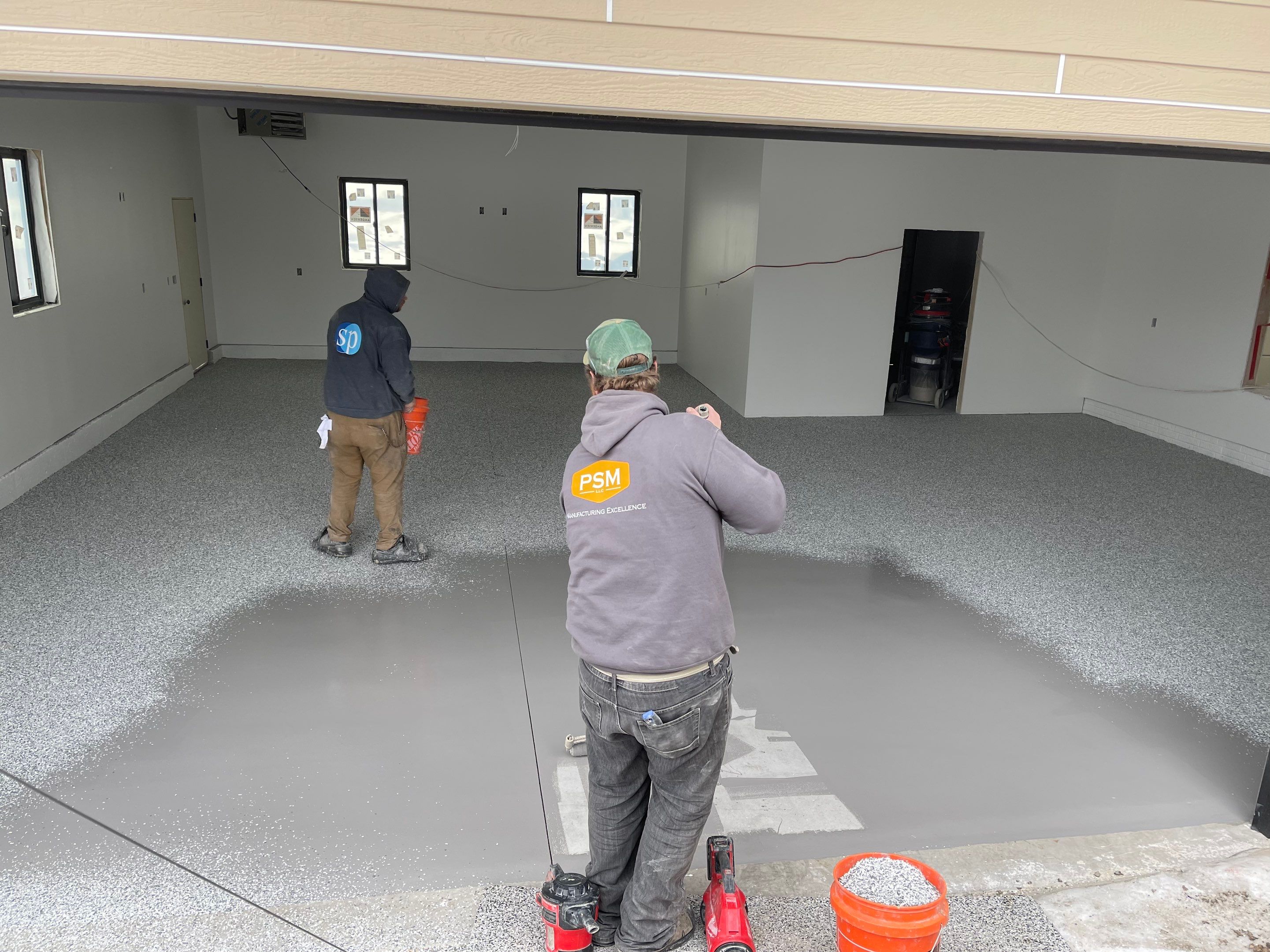 Garage using Slate Stone by Select Painting, Coatings & Garage Cabinets