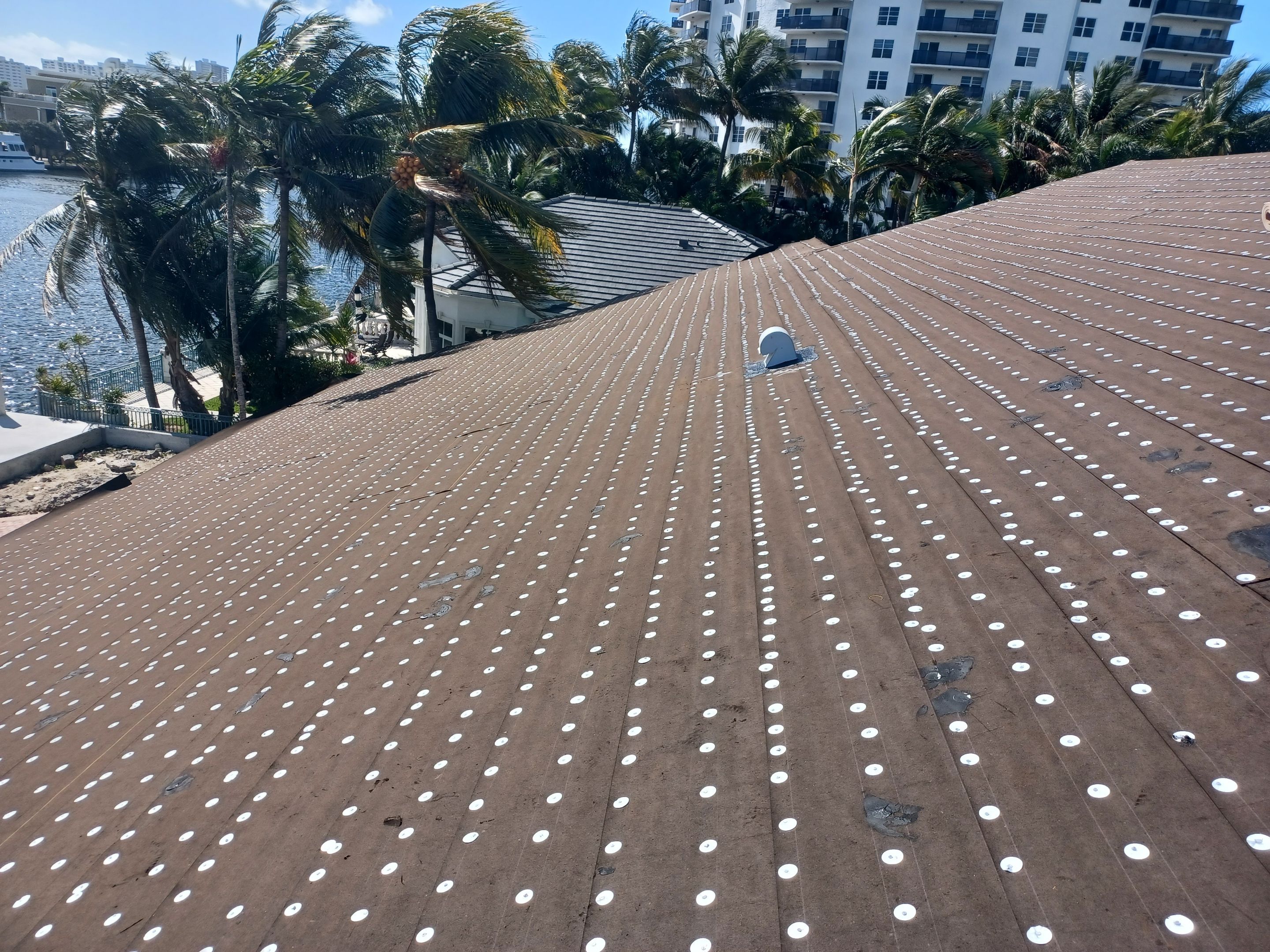 Residential Roofing Installation using 1" Nail strip metal roof by BLUES BROTHERS ROOFING
